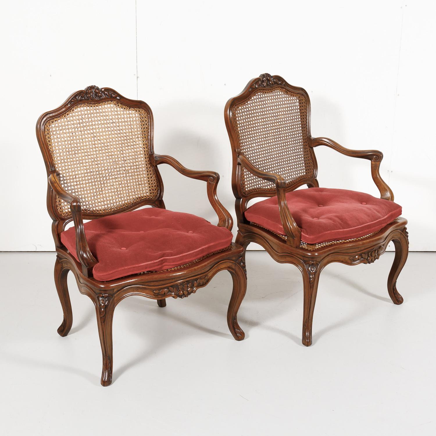 Late 19th Century Pair of 19th Century Country French Louis XV Style Walnut and Cane Armchairs