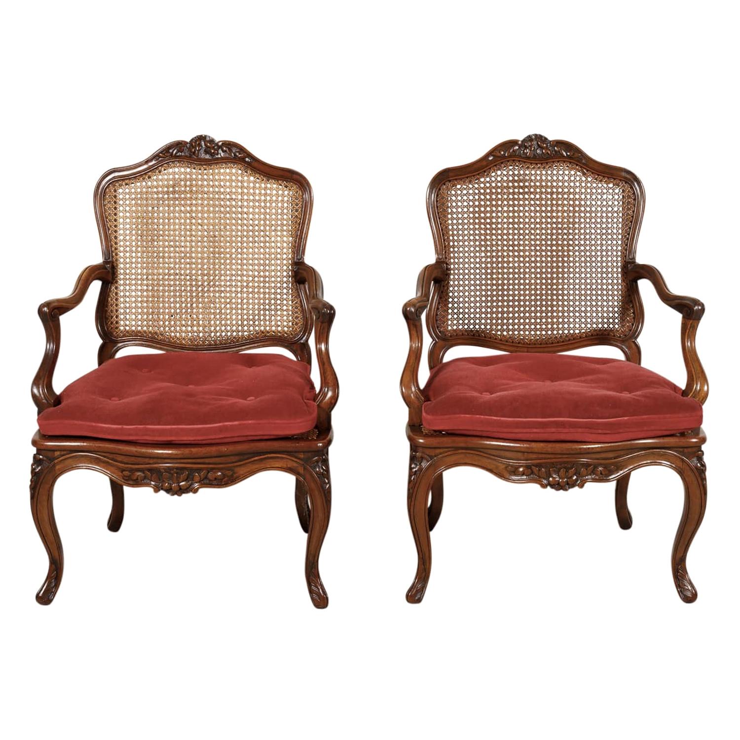 Pair of 19th Century Country French Louis XV Style Walnut and Cane Armchairs