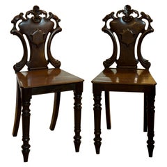 Pair of 19th Century Crested Hall Chairs, circa 1860