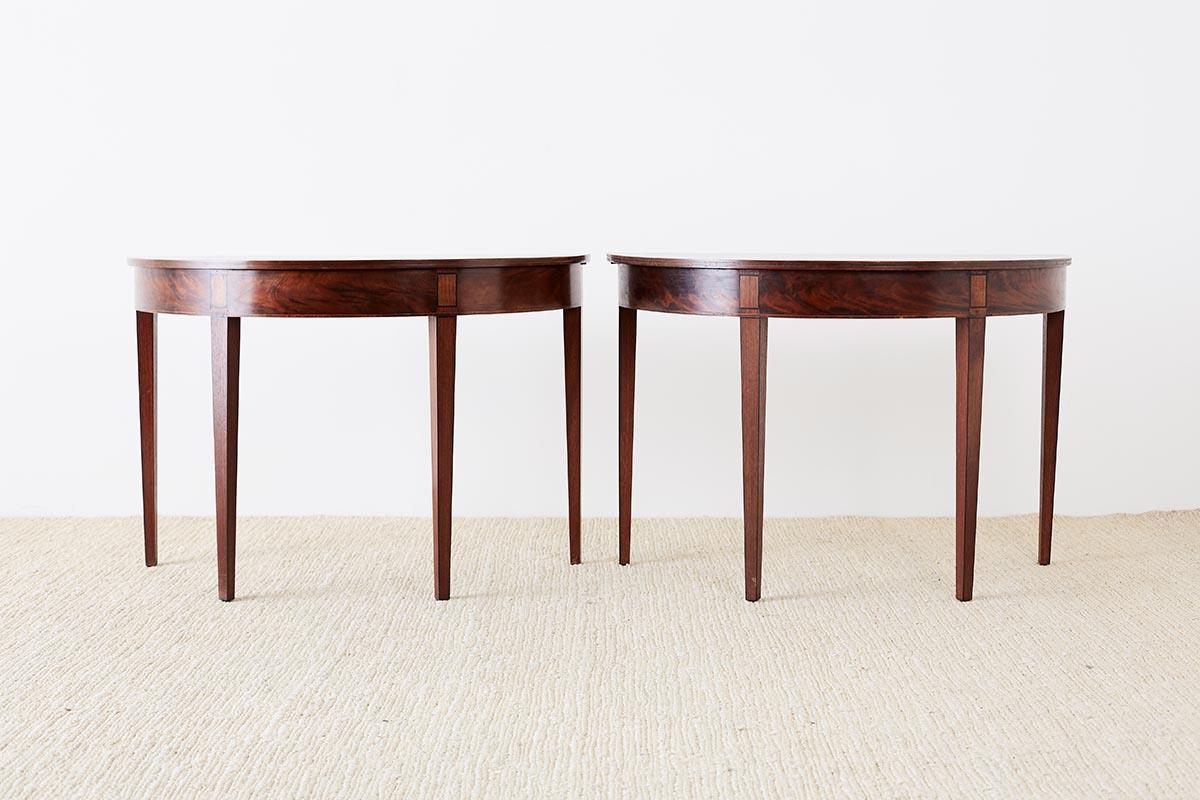 Pair of 19th Century Demilune Consoles Tables (George III.)