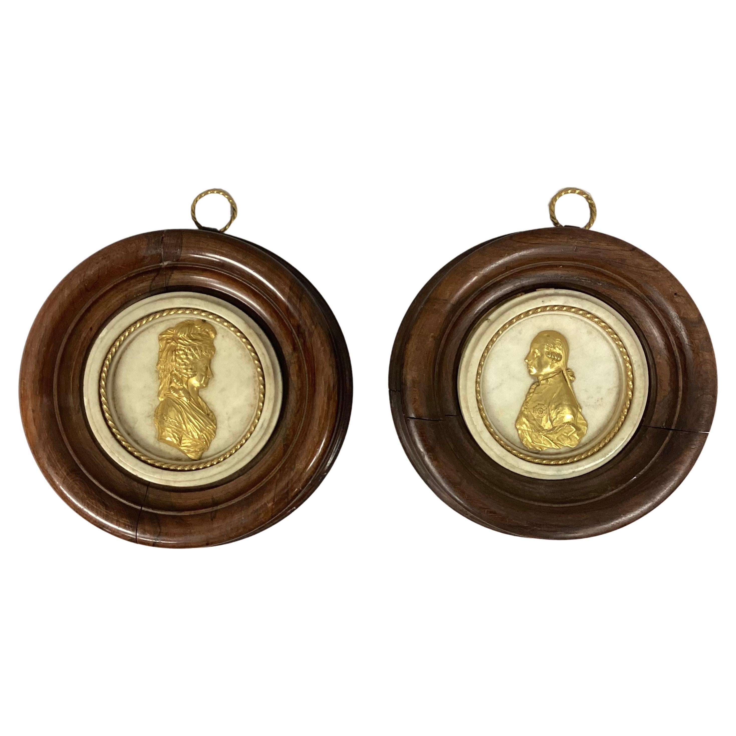 Pair Of 19th Century Doré Bronze Portrait Medallions Mounted on Carrara Marble For Sale