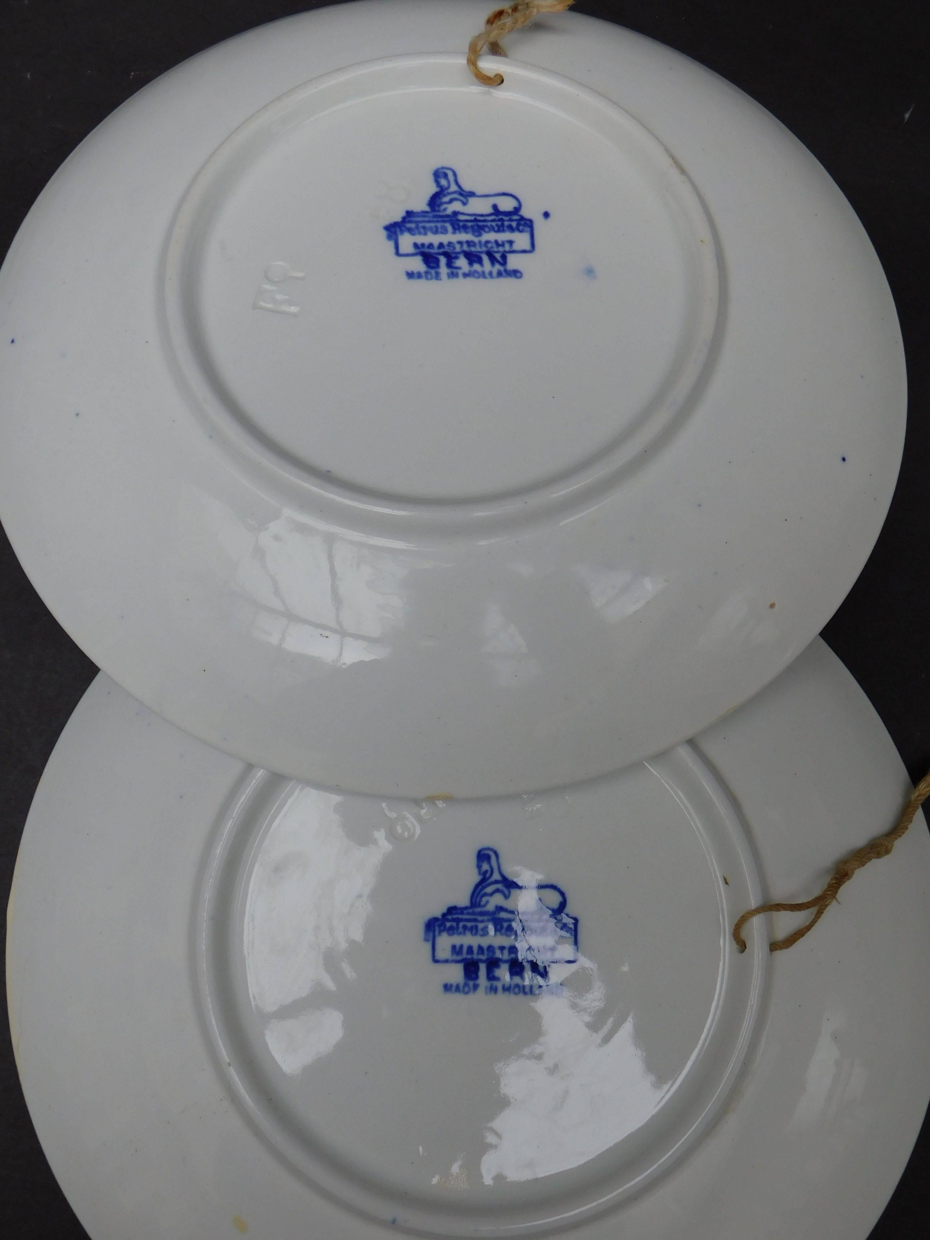 A fine example of Dutch transfer ware, these plates were made in Maastricht Holland by the Petrus Regout company towards the end of the 19th century.
Both plates are marked on the reverse with the 