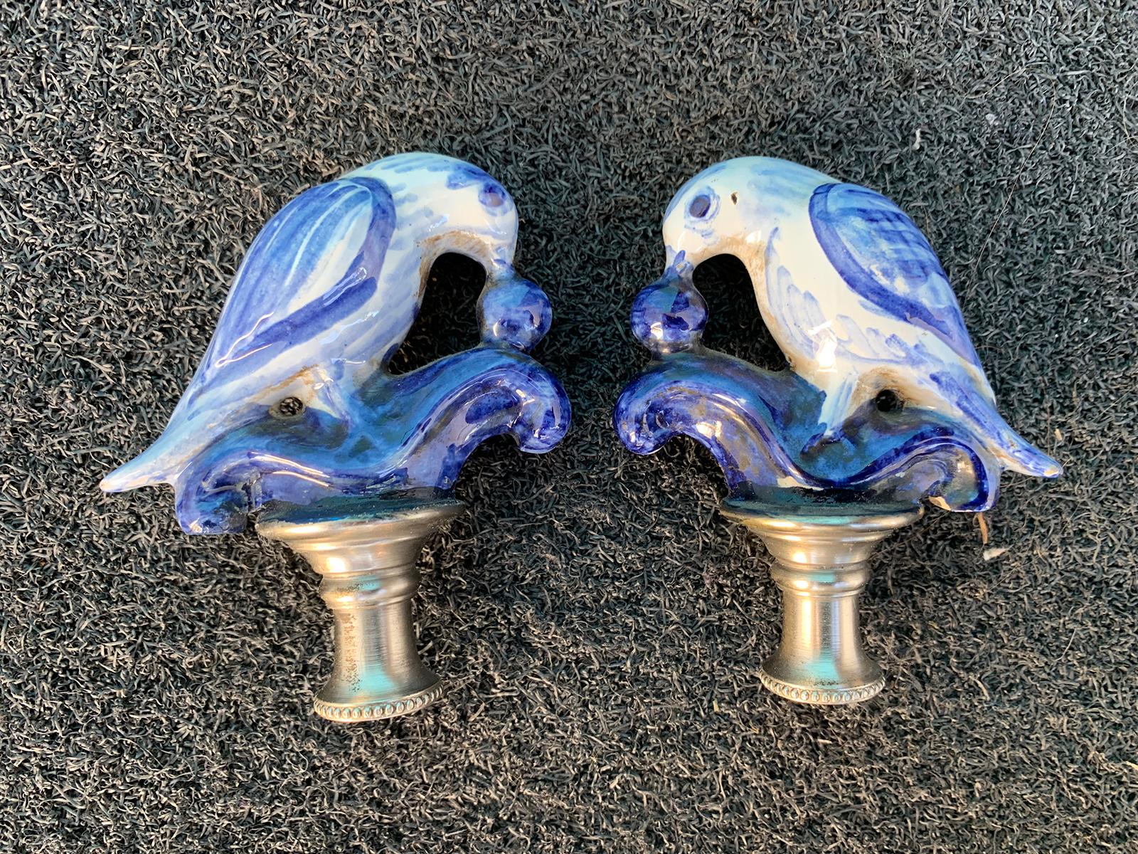 Pair of 19th century Dutch delft blue and white lamps with porcelain parrot finials
Measures: 7.25