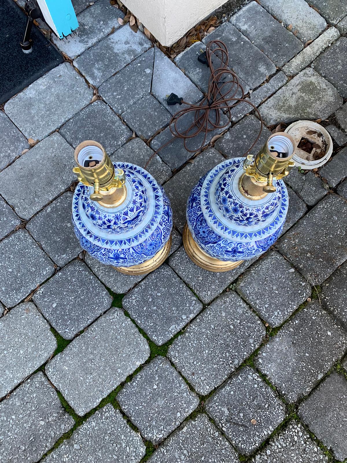 Pair of 19th Century Dutch Delft Blue and White Lamps, Gilded Bases 7