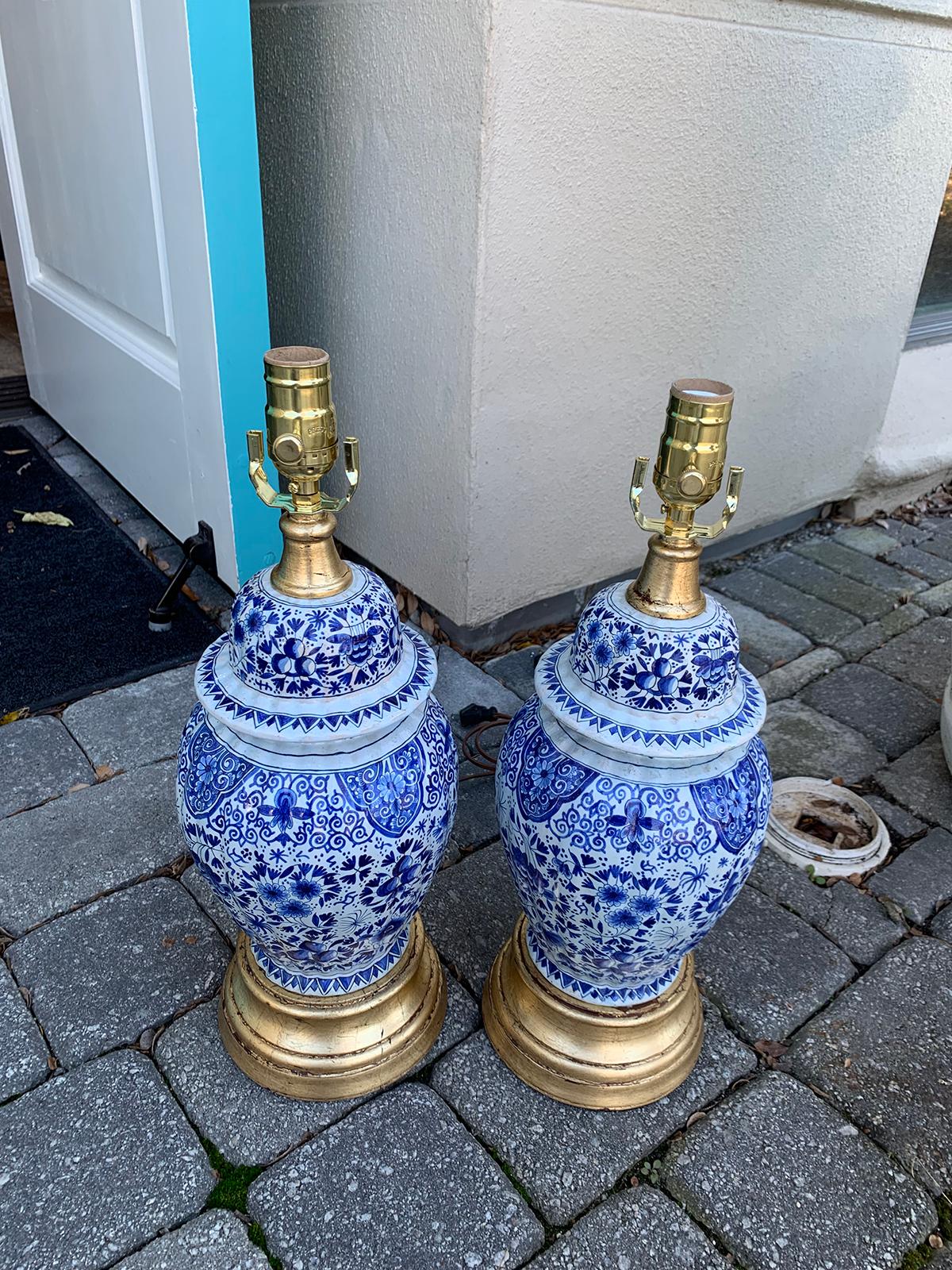 Pair of 19th Century Dutch Delft Blue and White Lamps, Gilded Bases 1