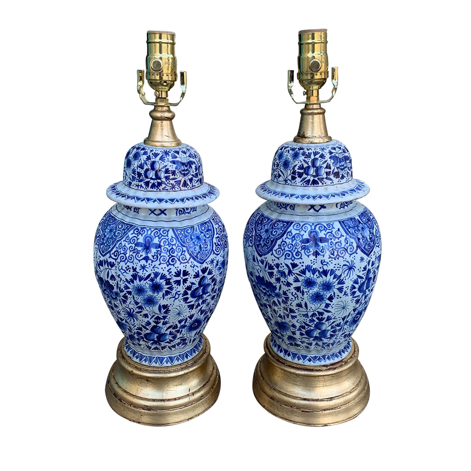 Pair of 19th Century Dutch Delft Blue and White Lamps, Gilded Bases