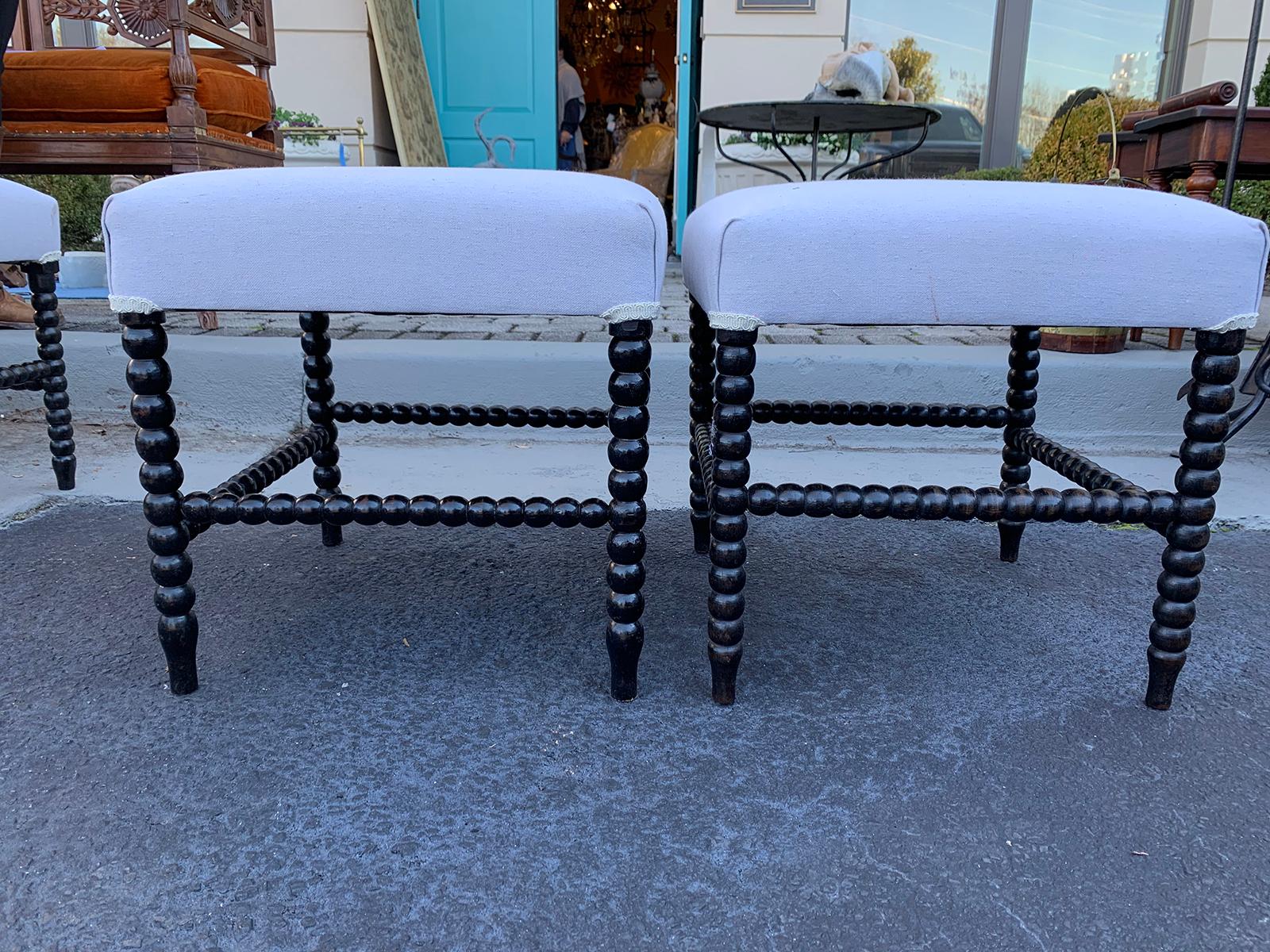 Pair of 19th century ebonized bobbin stools.