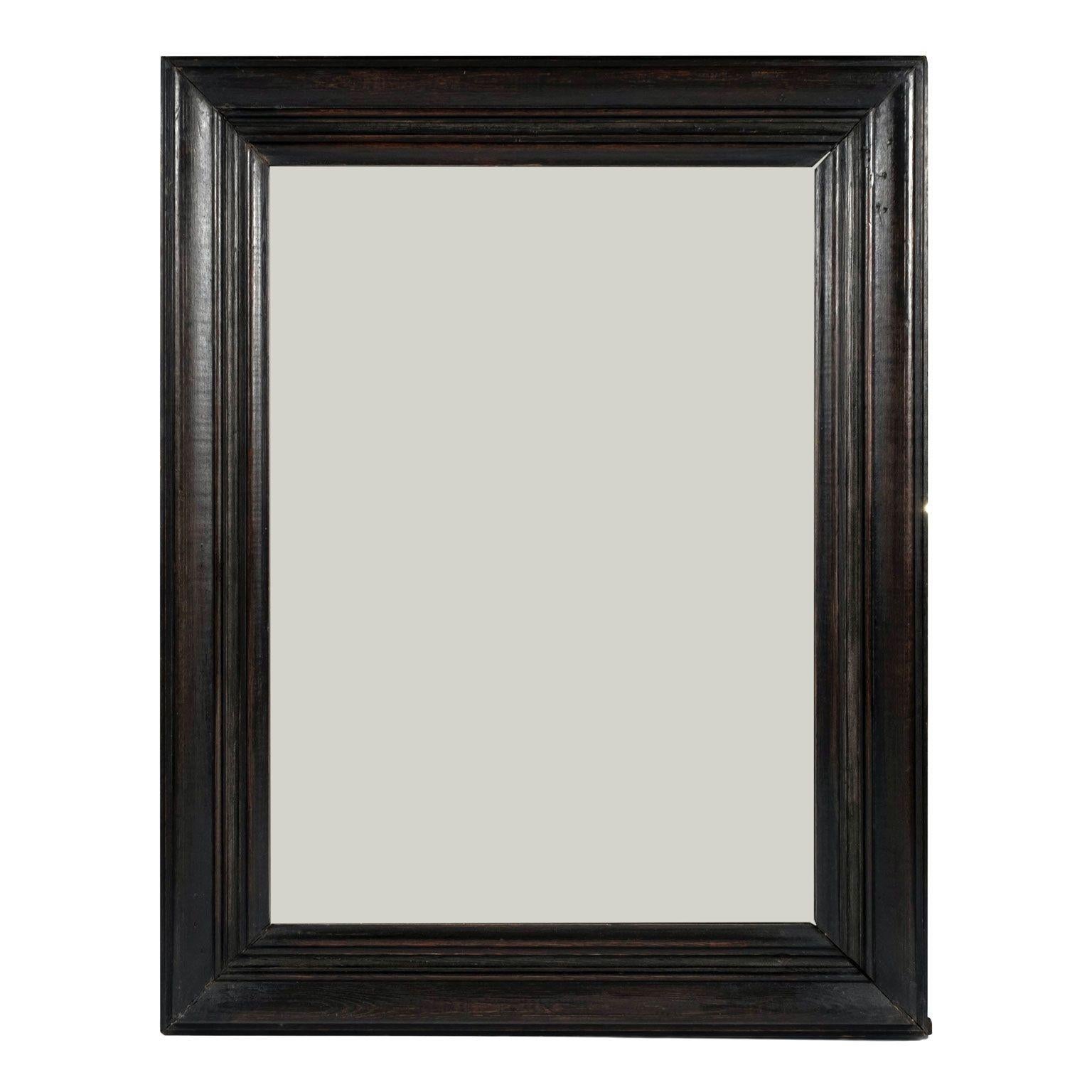 Pair of 19th century ebonized mirrors, circa 1860-1889, France.  Sold together and priced $9,900 for the pair.