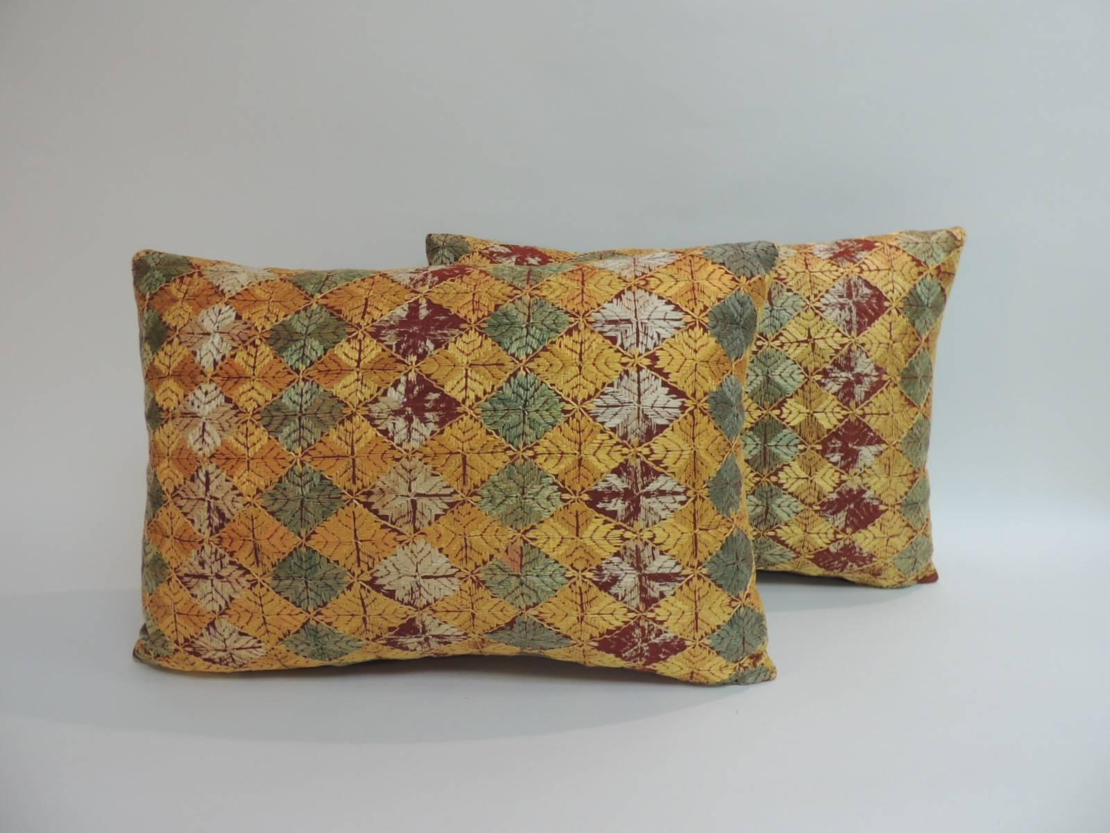 Diamond pattern in the front in shades of yellow, green and gold.
Silk threads on cotton with a moss green linen backings.
Decorative pillow handcrafted and designed in the USA. 
Closure by stitch (no zipper closure) with a custom-made pillow