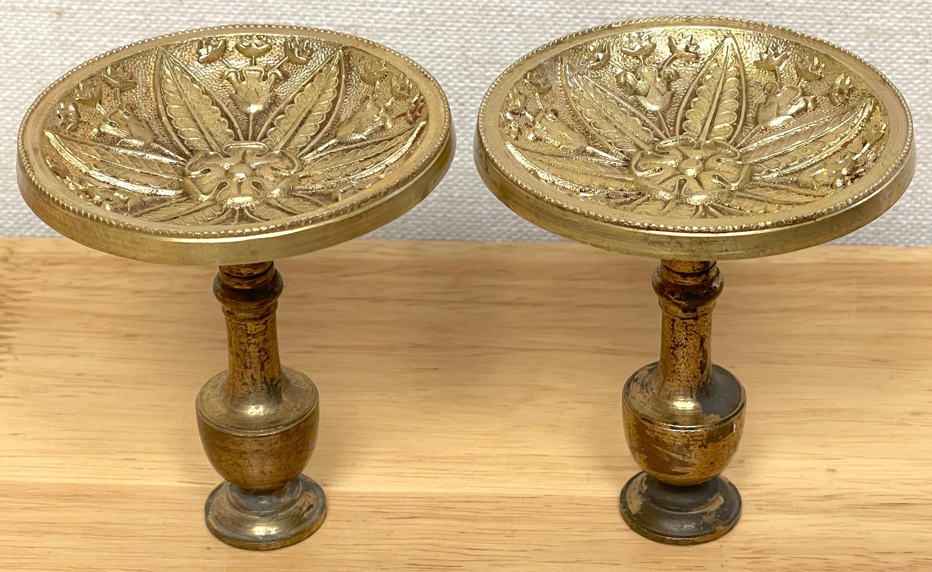 Pair of 19th century Empire Ormolu Acanthus Motif curtain tie backs
France, 19th Century 
A splendid pair of French Empire Ormolu acanthus motif curtain tie backs. Of typical circular form, with fine chasing and engraving. Both tiebacks retain the