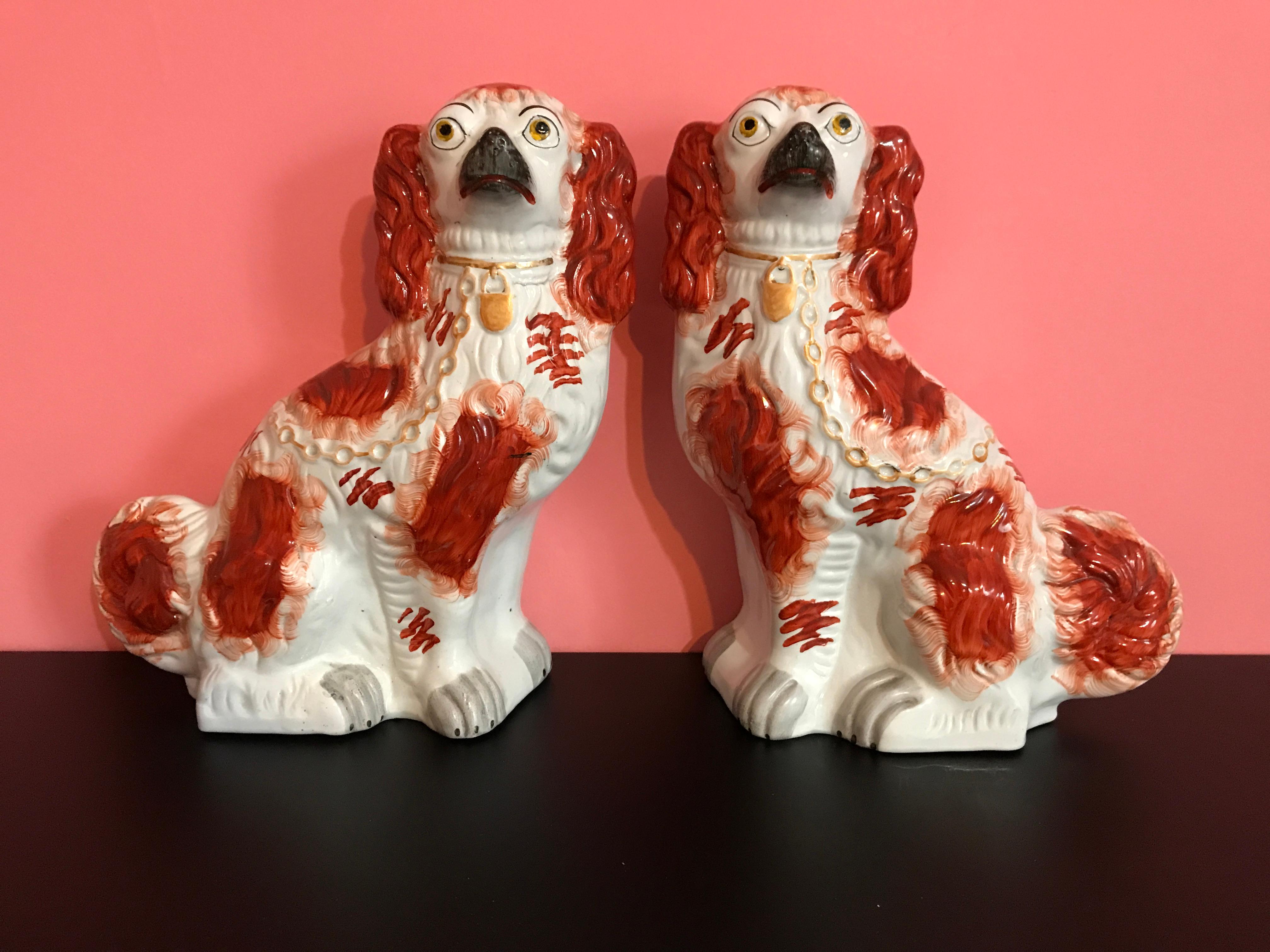 Pair of #1 Staffordshire English red seated Spaniel dogs, circa 1865, exceptional examples.
 