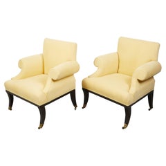 Pair of 19th Century English Armchairs with Out-Scrolling Arms and Saber Legs