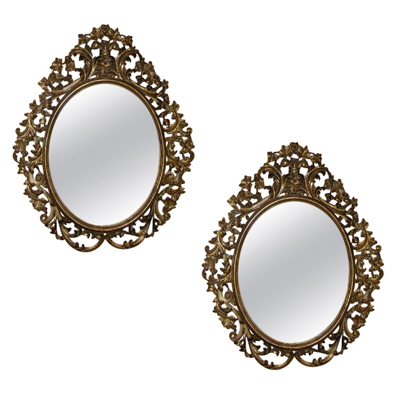 Pair of 19th Century English Carved Giltwood Oval Mirrors For Sale