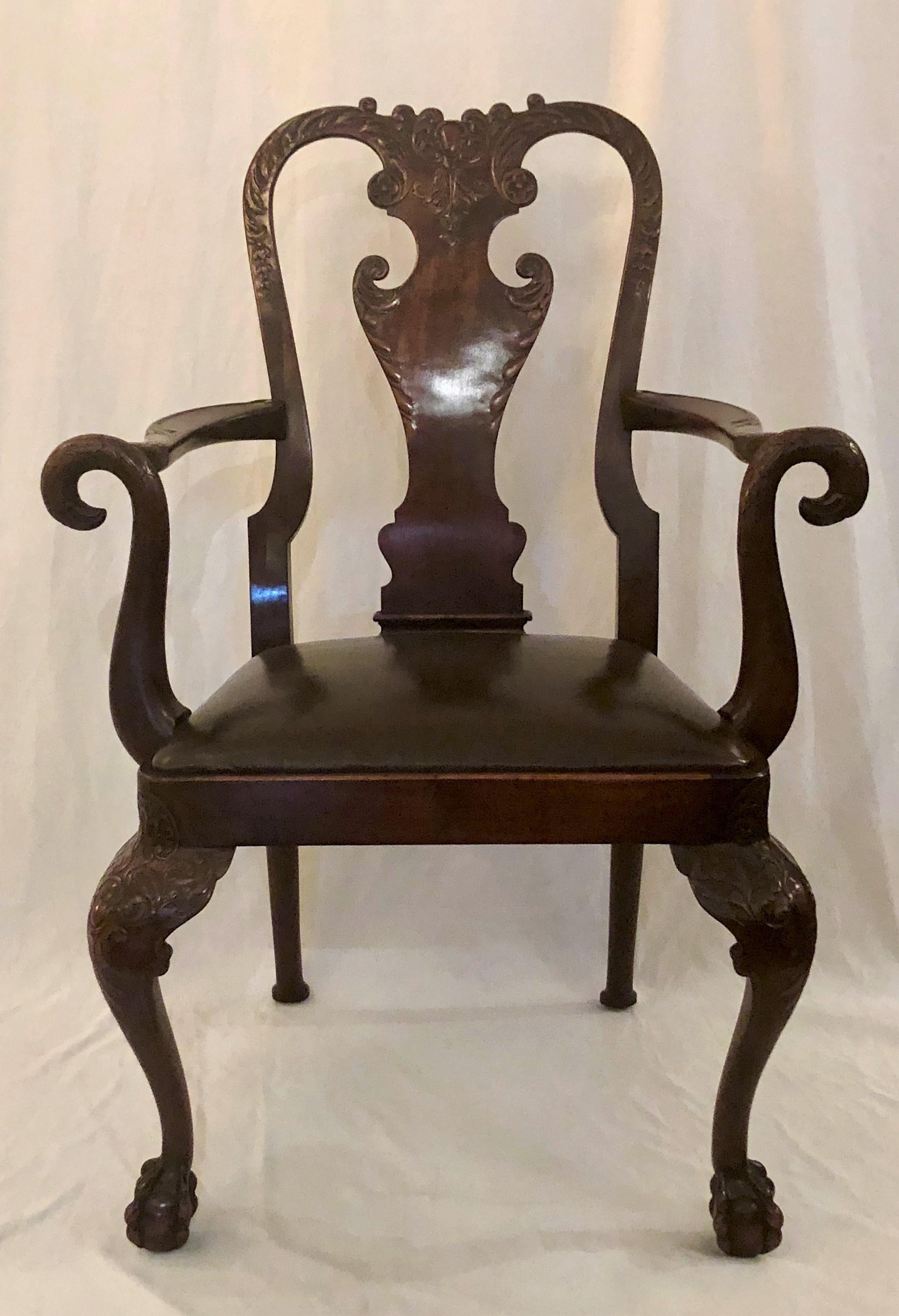 Pair of 19th century English carved mahogany armchairs.