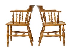 Pair of 19th Century English elm elbow chairs