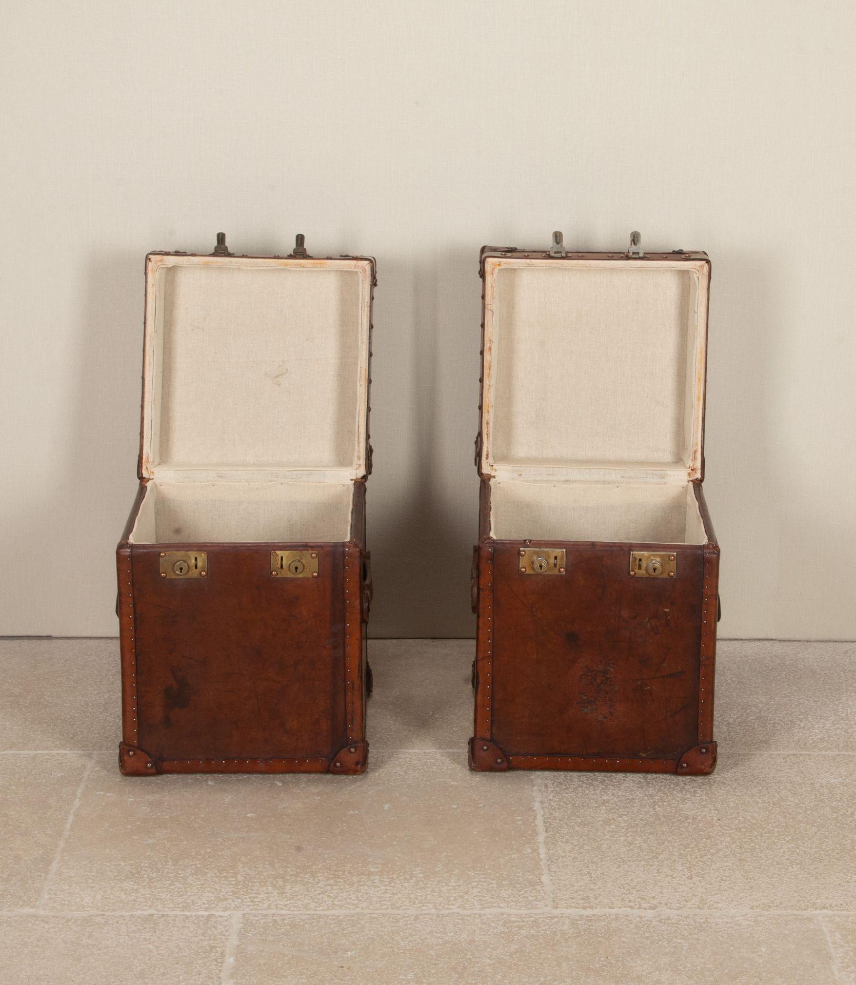 Pair of 19th Century English leather trunks. Beautifully aged and deeply patinated after decades of polishing and lined in original cream linen. Monogrammed stamped G.N. With copper studs and brass banding, brass 'English Lever' locks. Leather