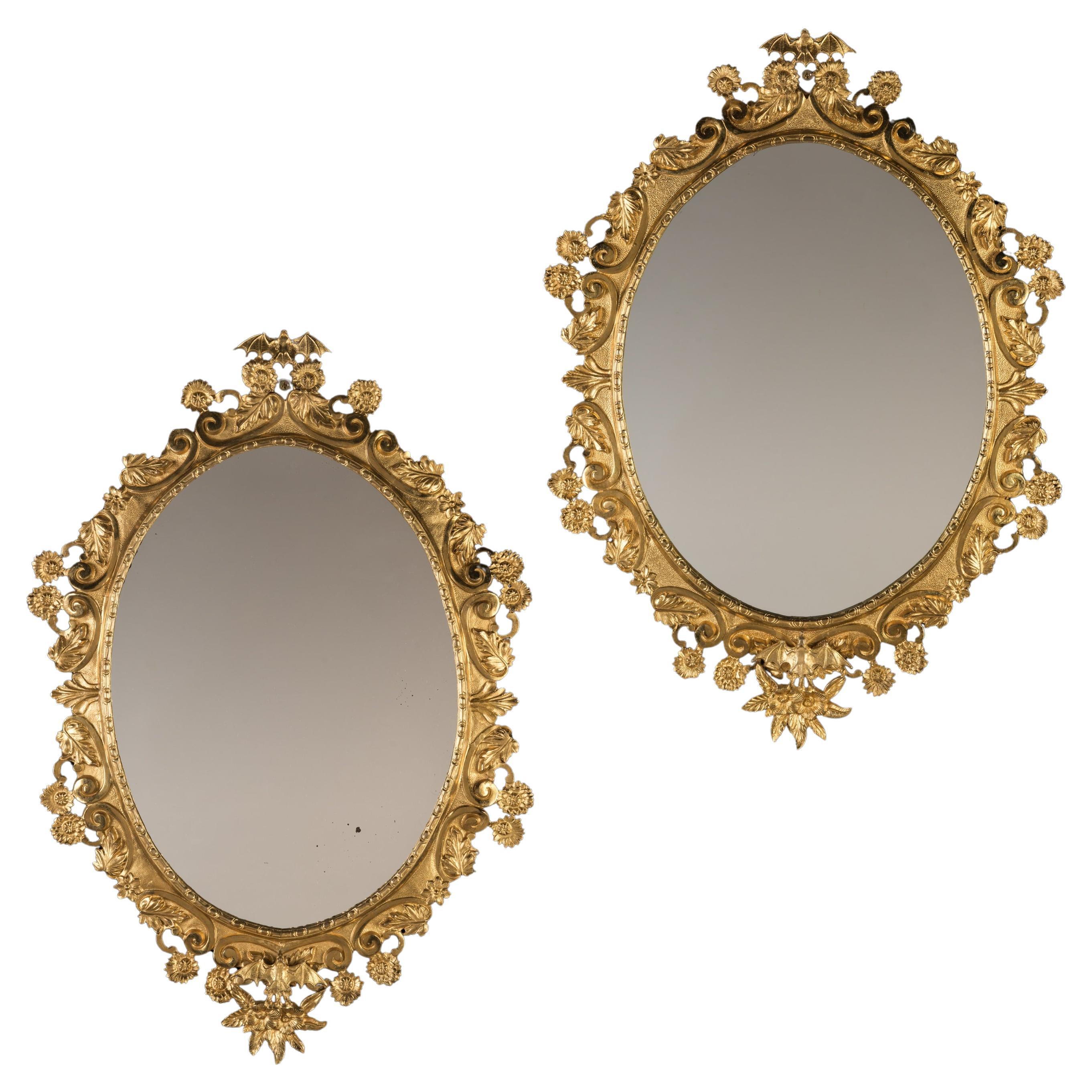 Pair of 19th Century English Ormolu Framed Oval Mirrors