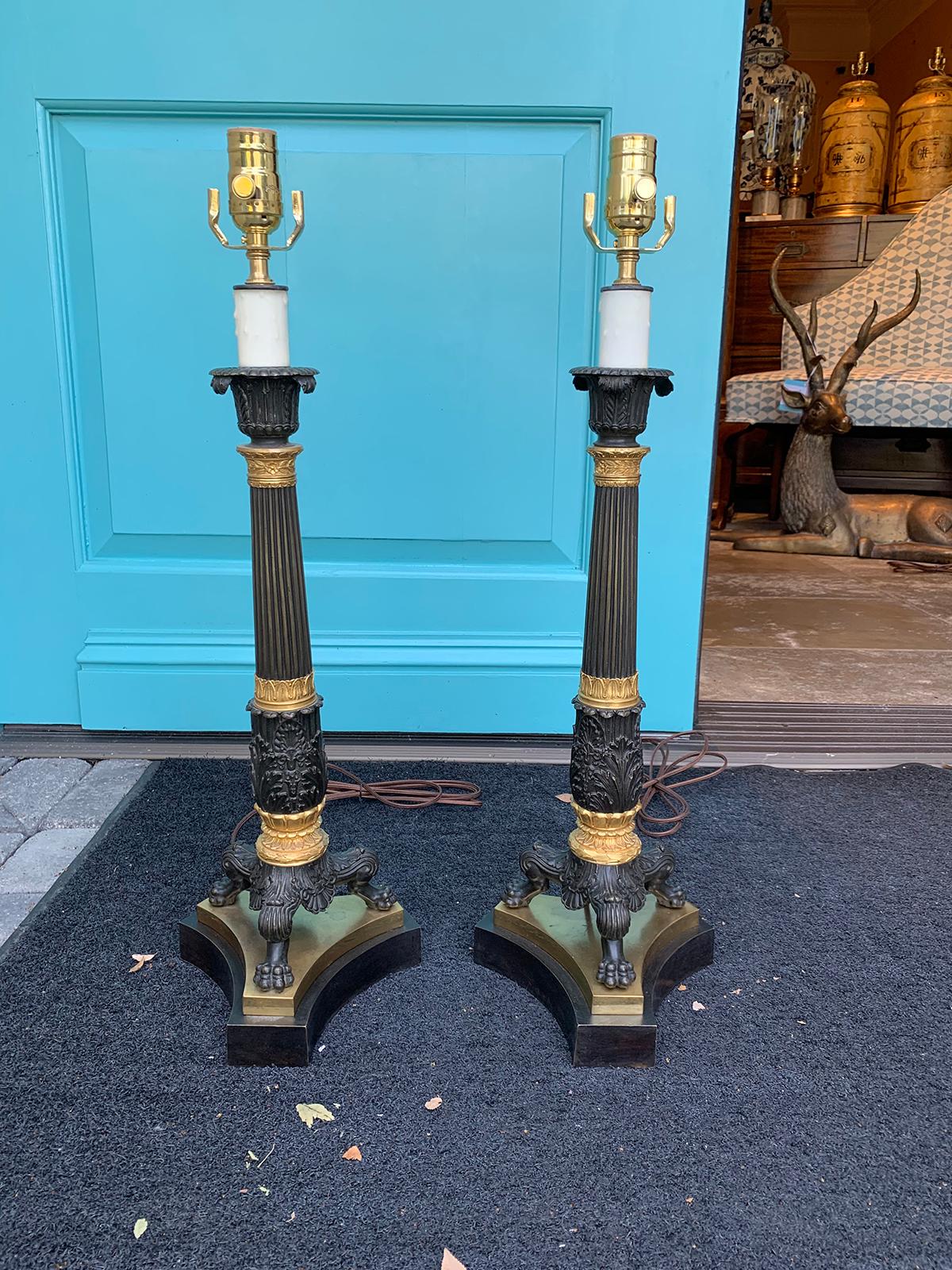 Pair of 19th century English Regency gilt and bronze candelabras as lamps
Brand new wiring.