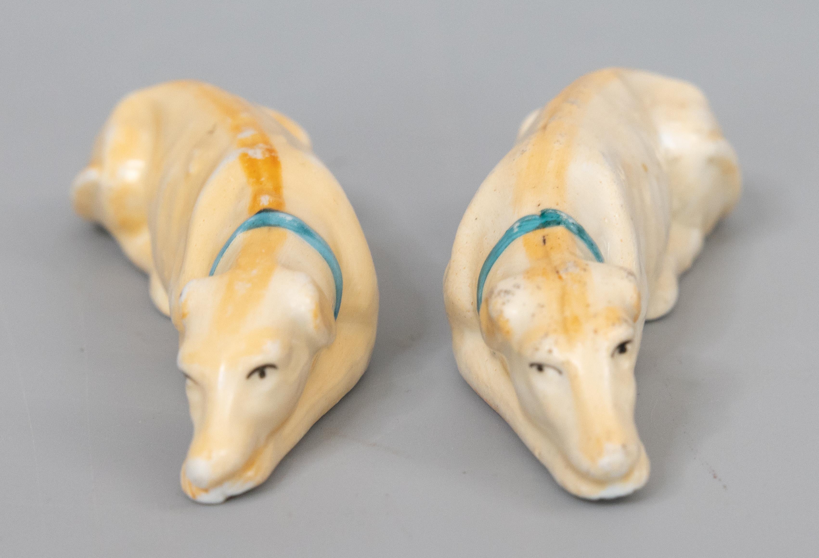 Ceramic Pair of 19th Century English Staffordshire Recumbent Greyhound Whippet Dogs For Sale
