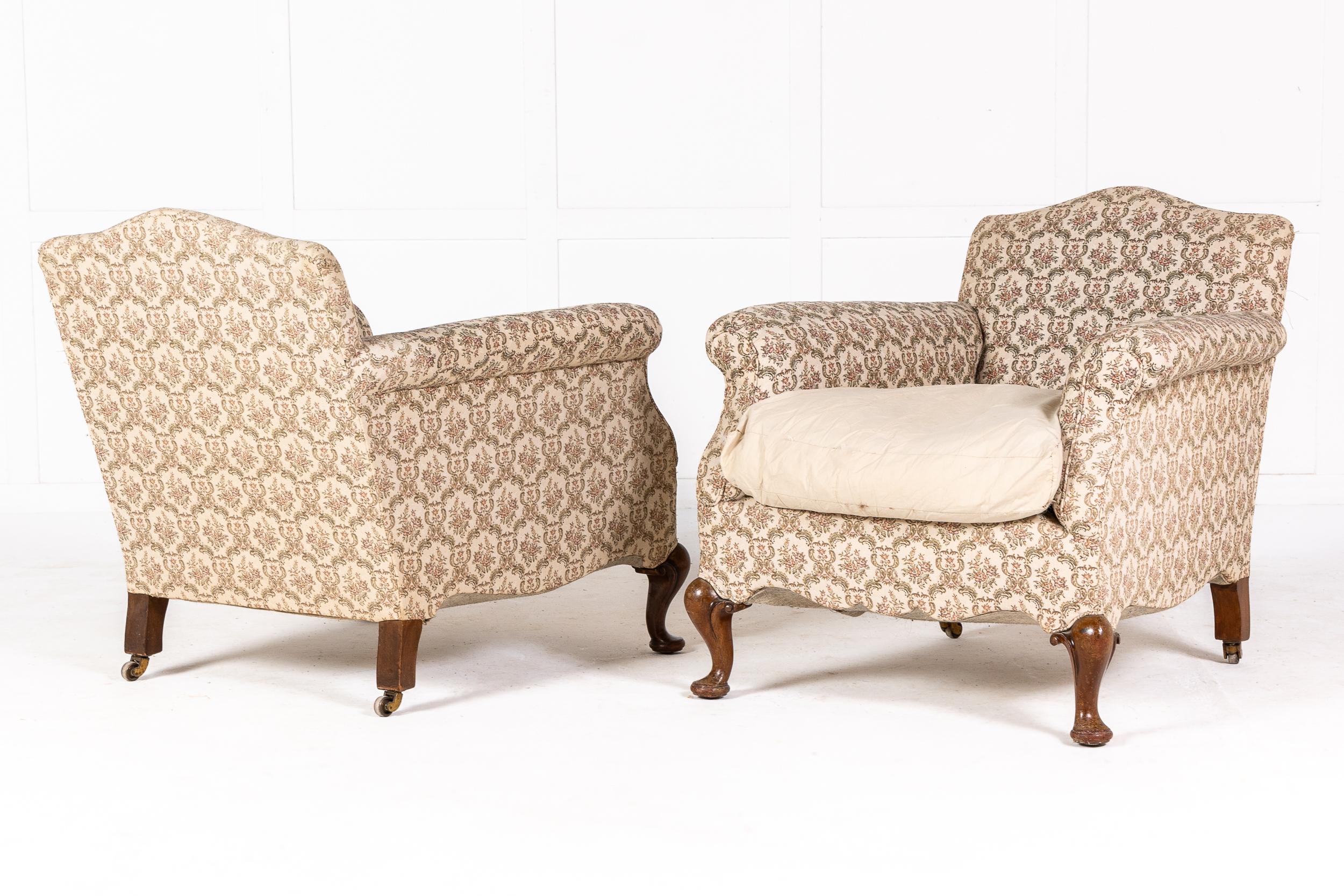 A Pair of 19th Century English Tub Bergère Armchairs.

On short cabriole front legs, these chairs are comfortable to sit in. They feature serpentine shaping to the front rails and large squab cushions.

Ready for reupholstery.
