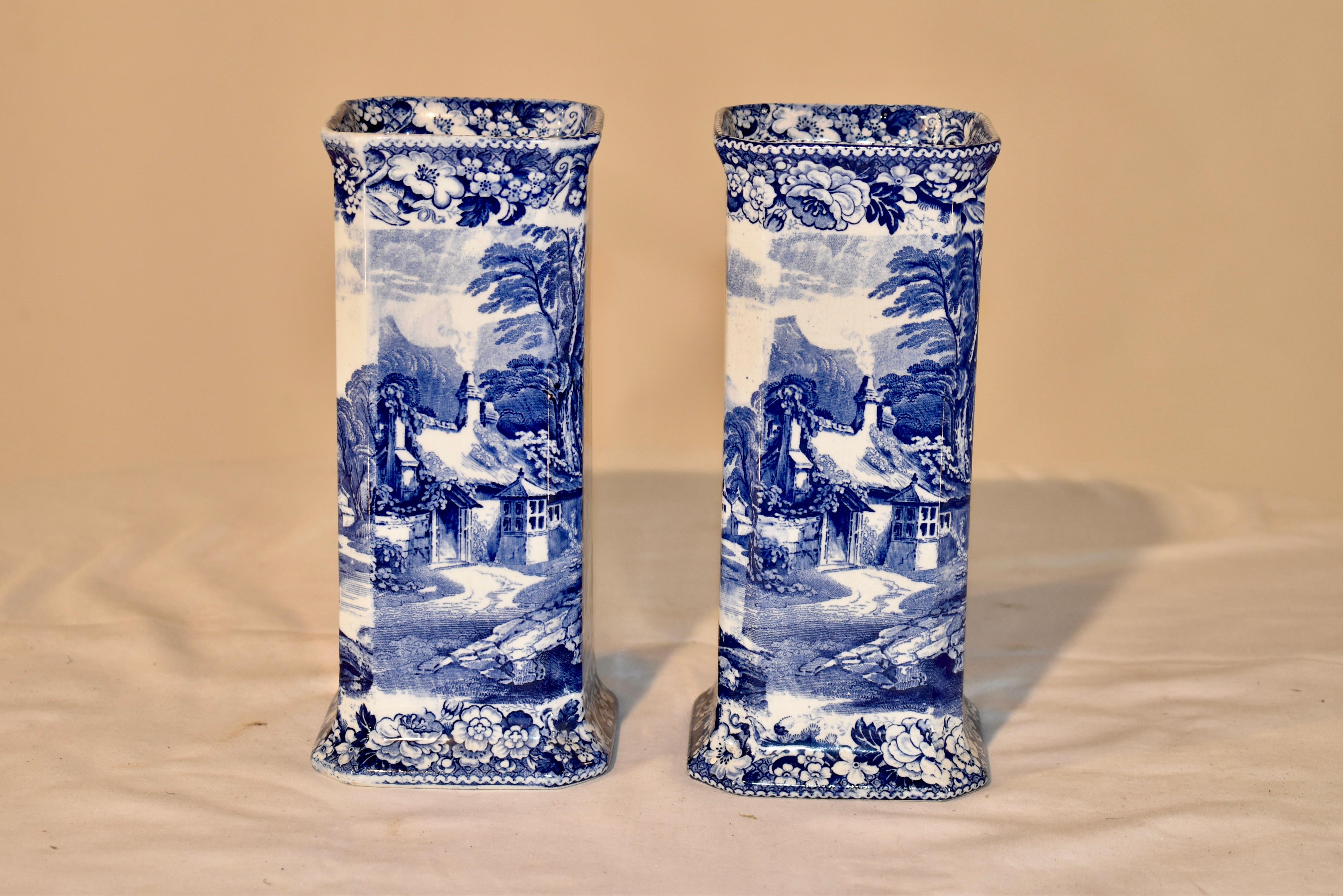 Pair of 19th century blue and white vases signed Pratt's Lake Scenery on the bases. They are lovely and unusual square shaped vases with gorgeous transfer ware decoration which depicts a cottage overlooking a lake and a family enjoying the outdoors.