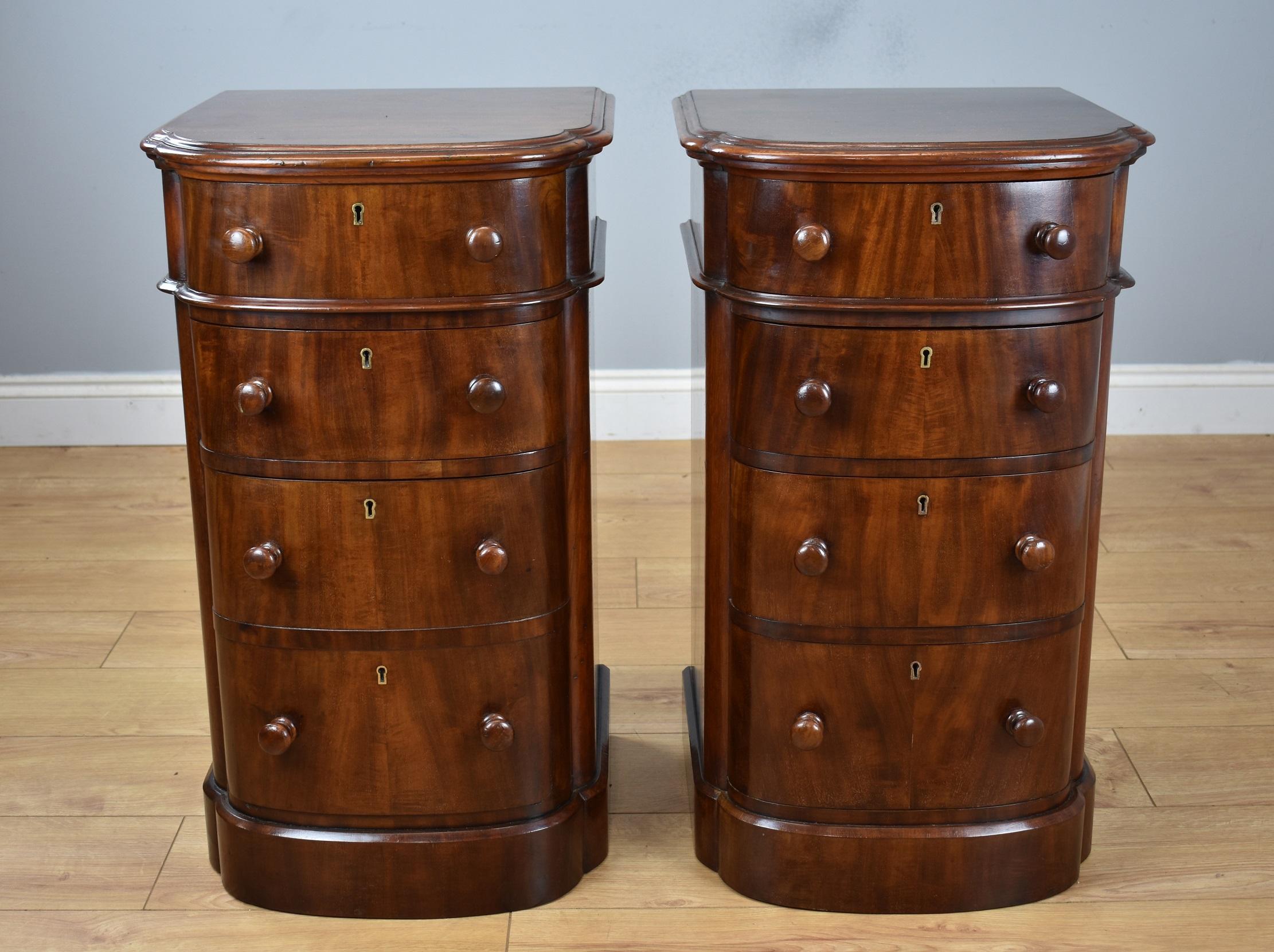 For sale is a pair of very good quality Victorian mahogany 
bow front bedside chests. Each having a shaped top, above drawers, all with original locks and turned handles, raised on a plinth base. One of the chests has a double height drawer at the