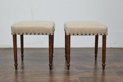 Pair of 19th Century English Wooden Stools with Linen Upholstery and Arrow Feet