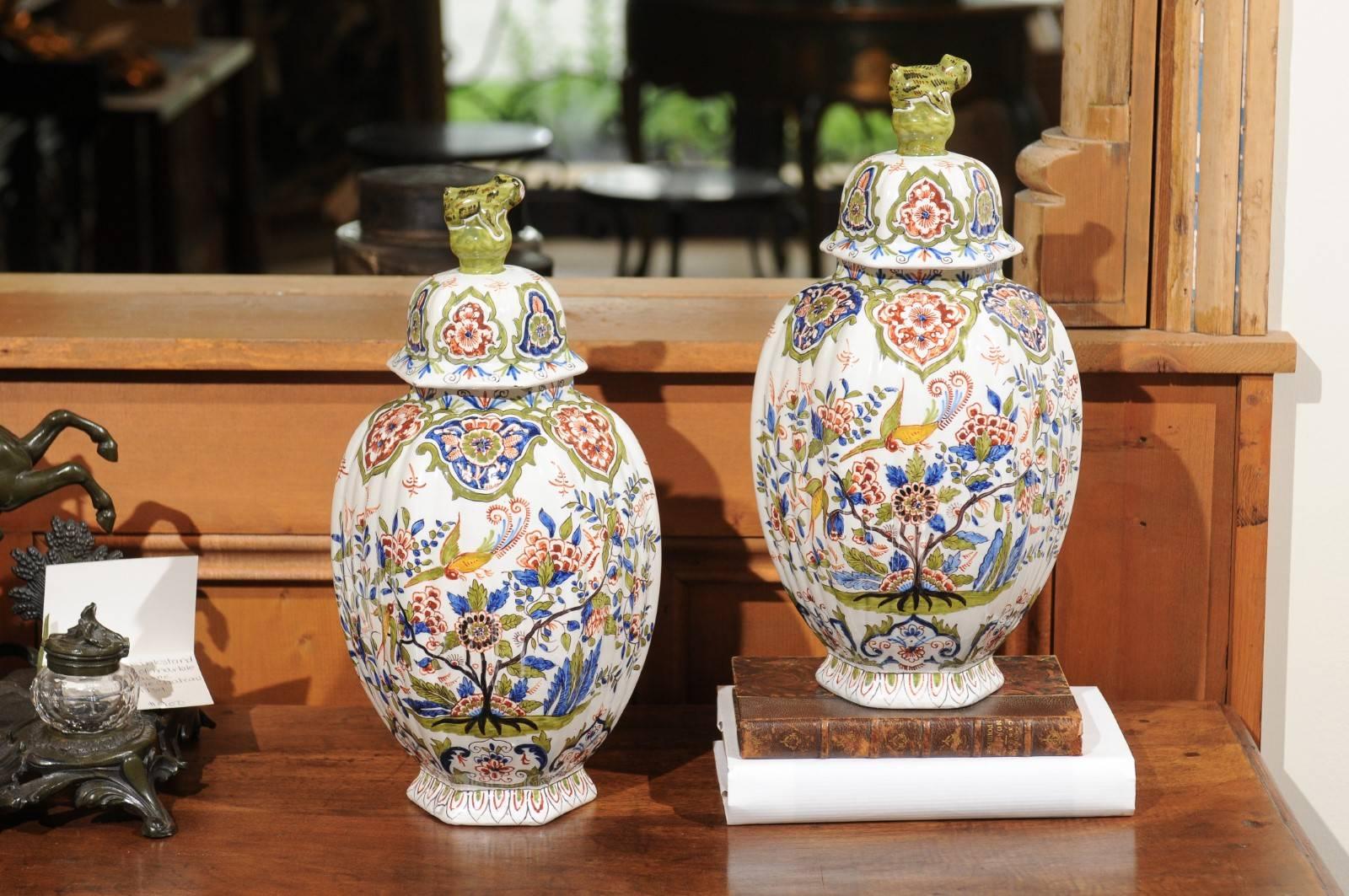 Pair of 19th century Faience Jars with Lids from Devres, France

Many people might think these jars were made in Holland but in fact many factories all over Europe made faience similar to that made in Delft. The colors are bright and clear adding