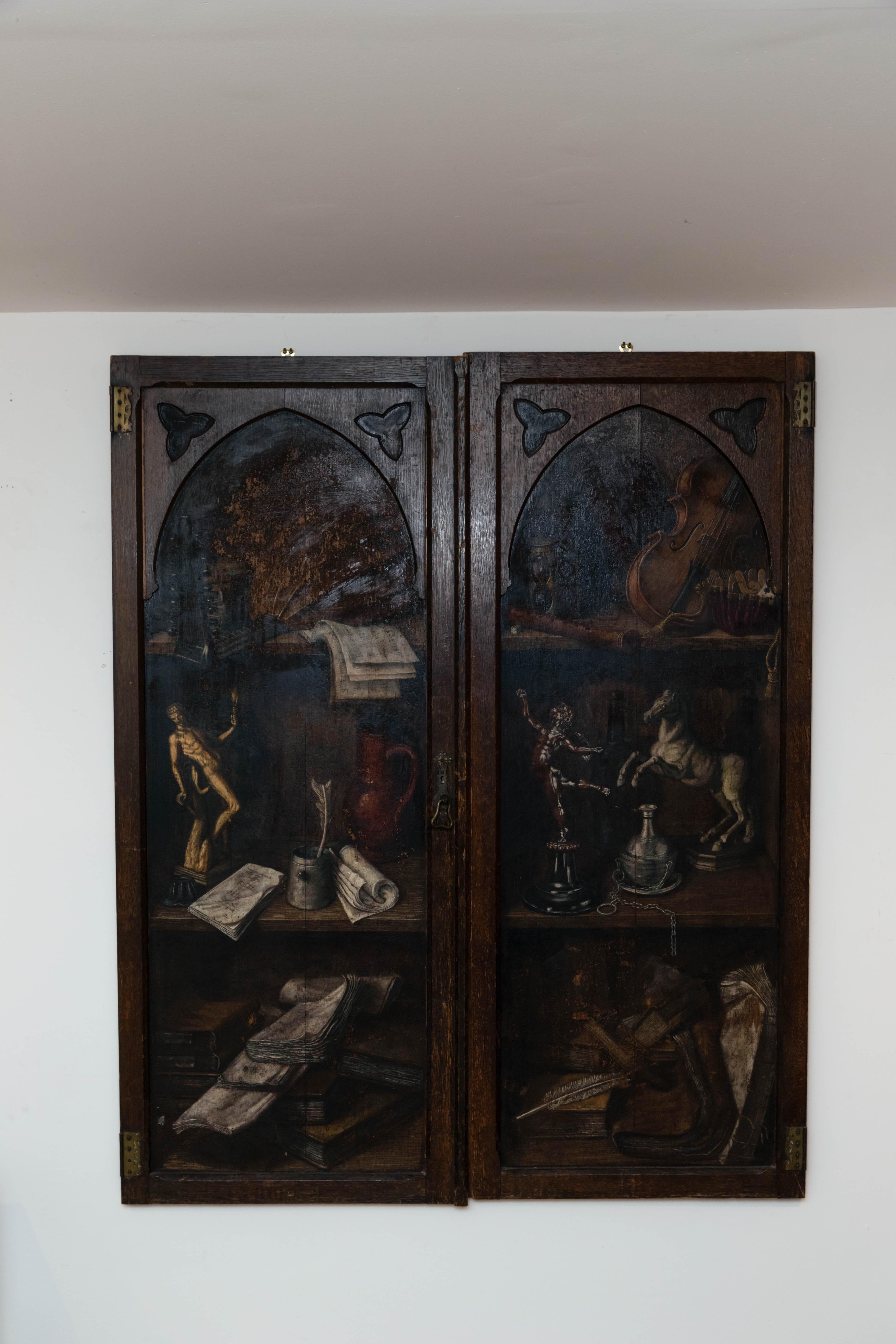 Pair of cabinet doors mounted into a wall hanging.