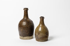 Pair of 19th century folk art stoneware ceramic bottles realised in La Borne