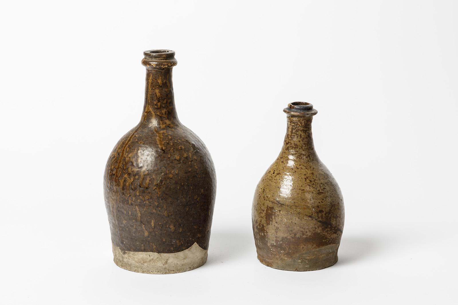 Folk Art Pair of 19th century folk art stoneware ceramic bottles realised in La Borne For Sale