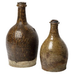 Pair of 19th century folk art stoneware ceramic bottles realised in La Borne