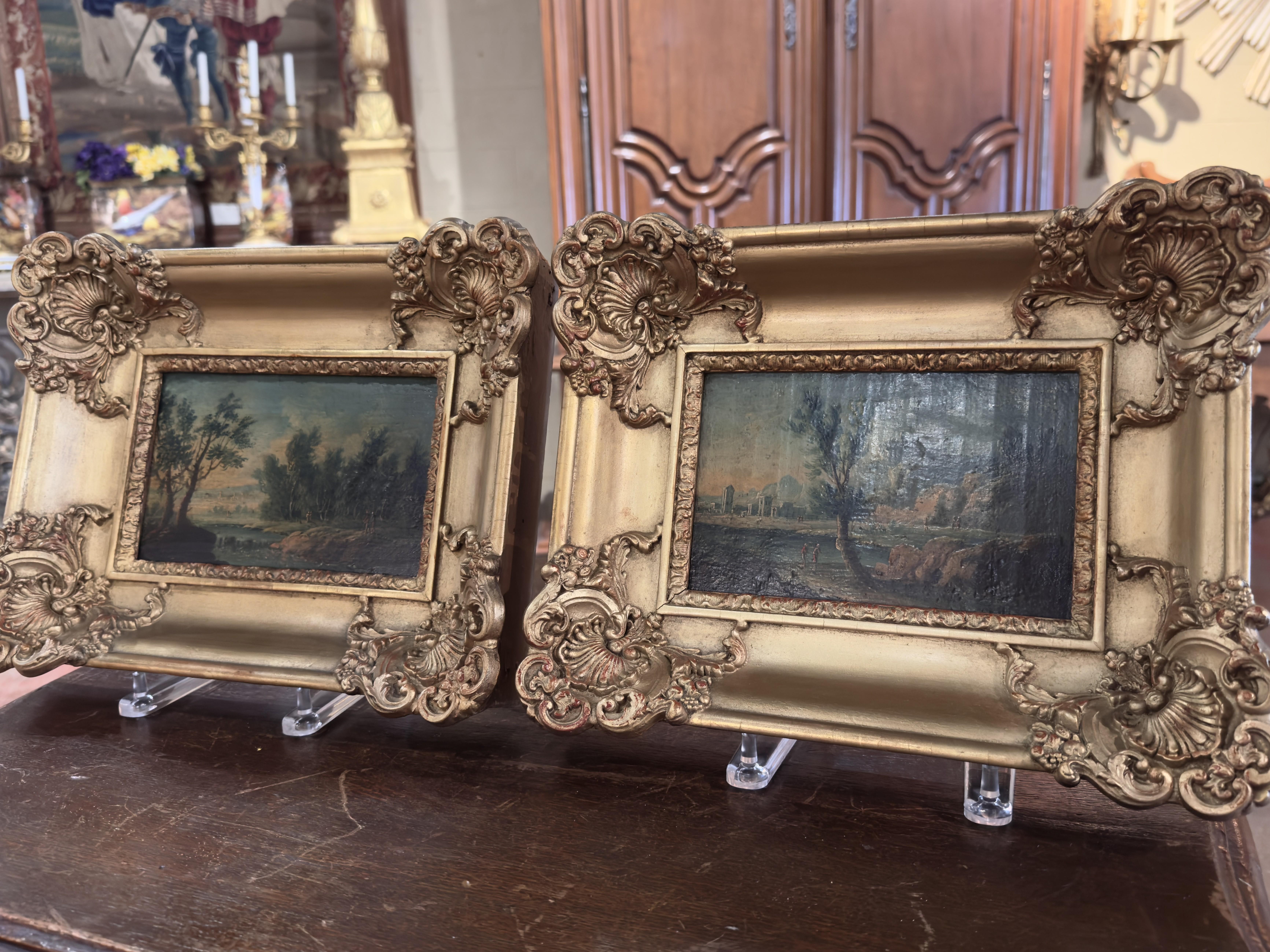 Decorate an office, hallway or powder room with this elegant pair of antique paintings. Created in France circa 1860, and signed on the back (unreadable), each painting is set in an ornate gilded Rococo-style frame decorated with raised scroll work,