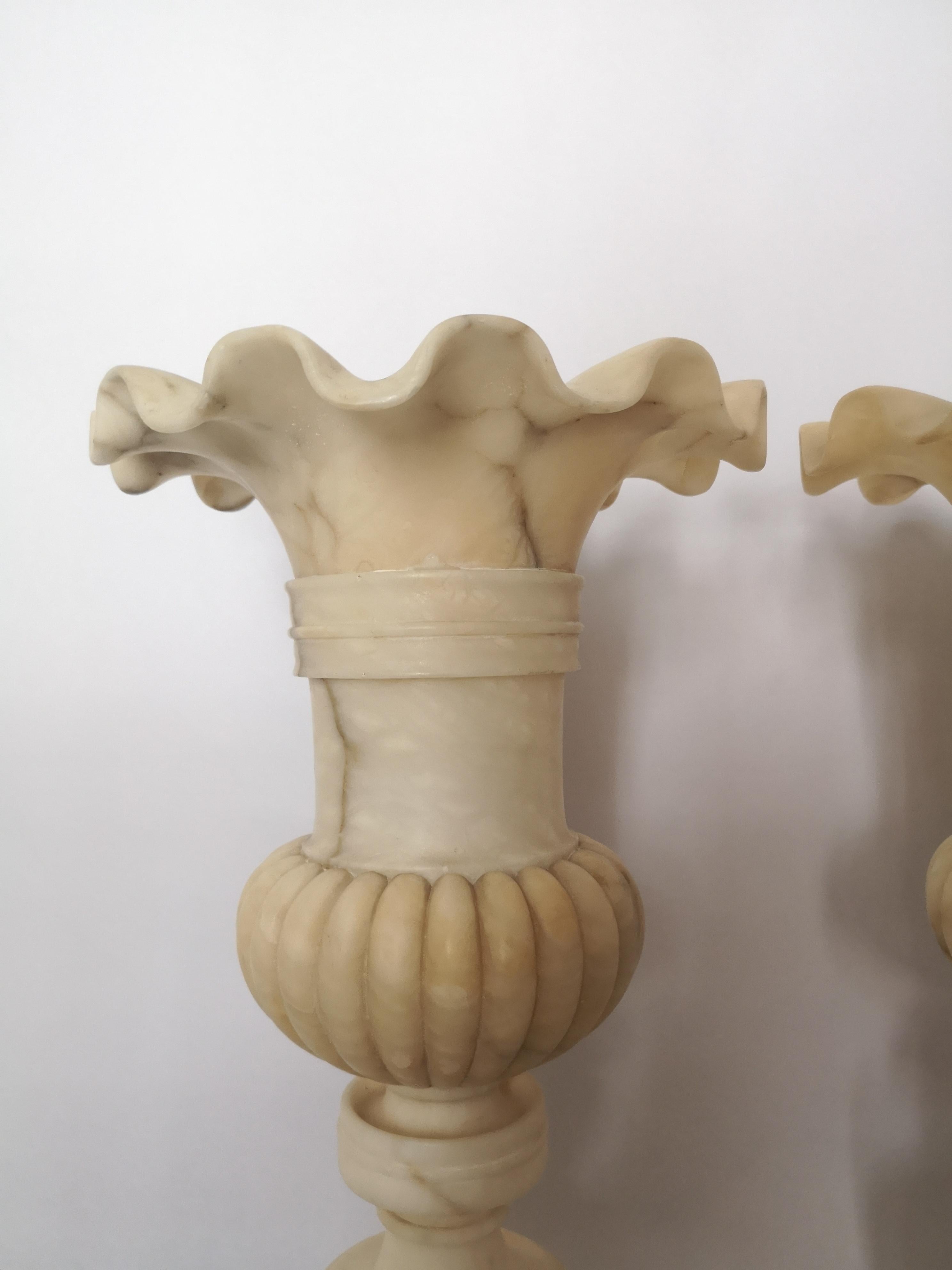 A decorative pair of 19th century French alabaster vases. With shaped rims, reeded bodies and standing on square bases.
French, circa 1890.
  