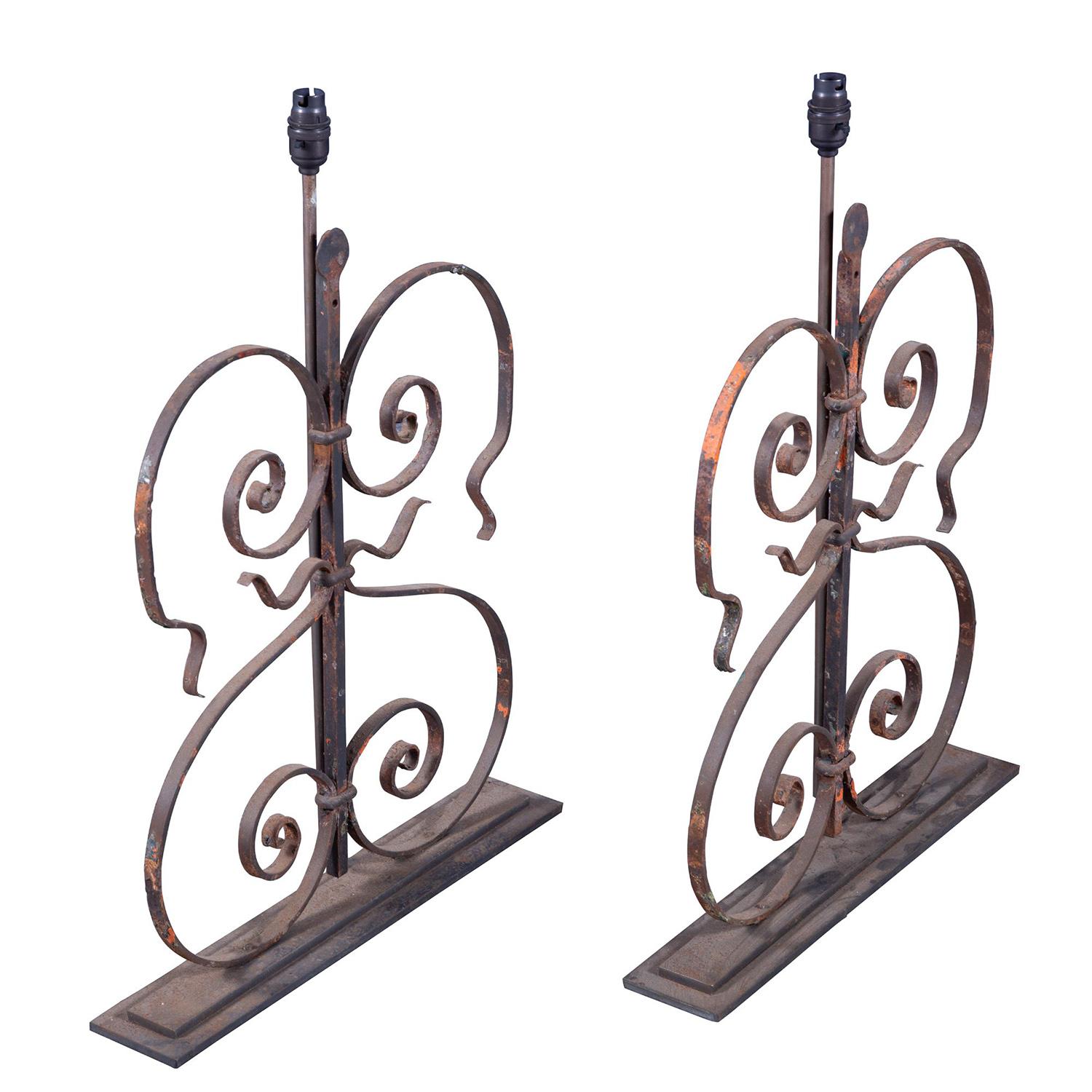 This pair of 19th century lamps are made from architectural fragments of a French 19th century metal balustrade. This piece has been rewired with silk cord to UK standards and PAT tested.
