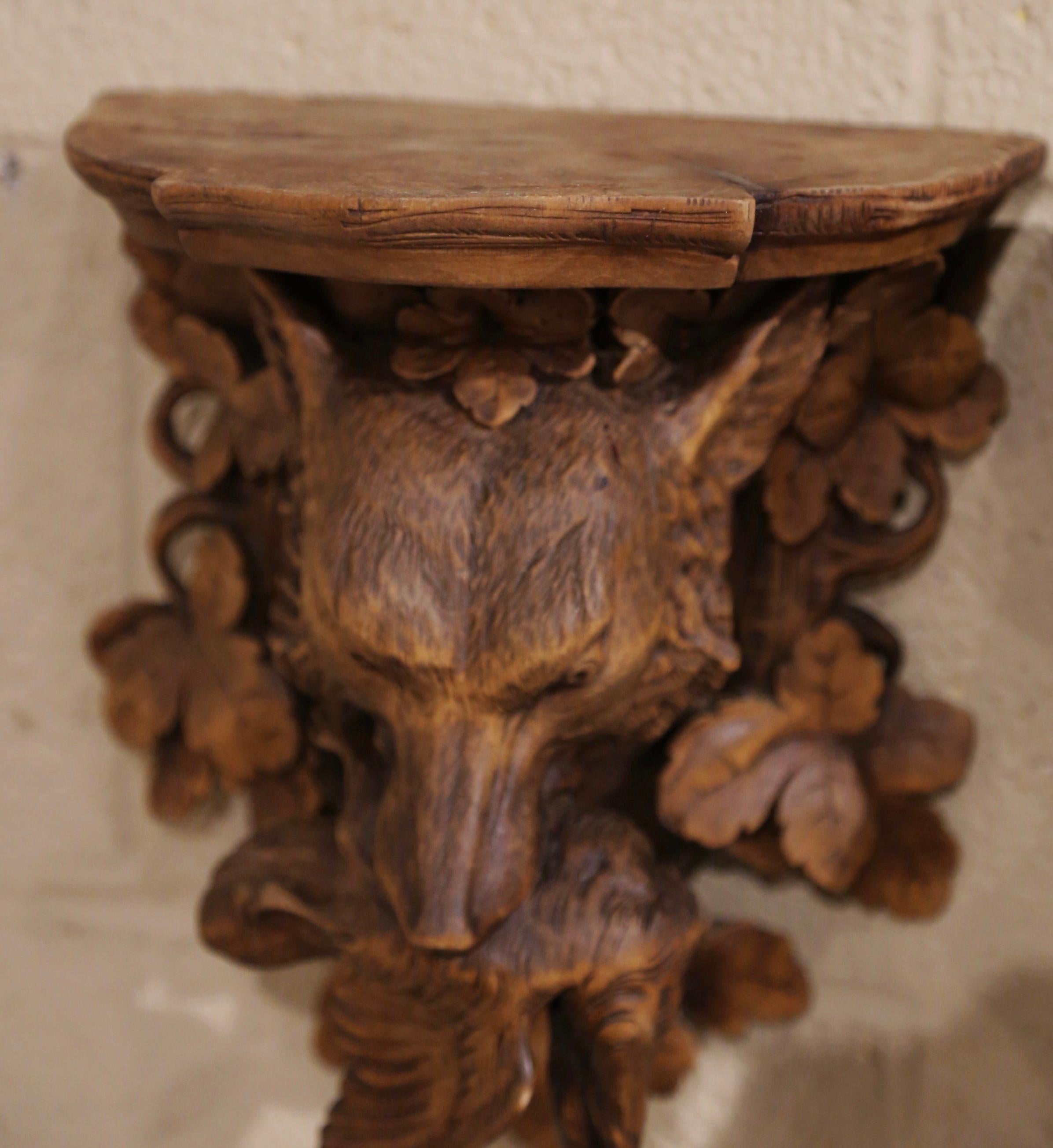 Pair of 19th Century French Black Forest Carved Walnut Hanging Shelves with Dog 3