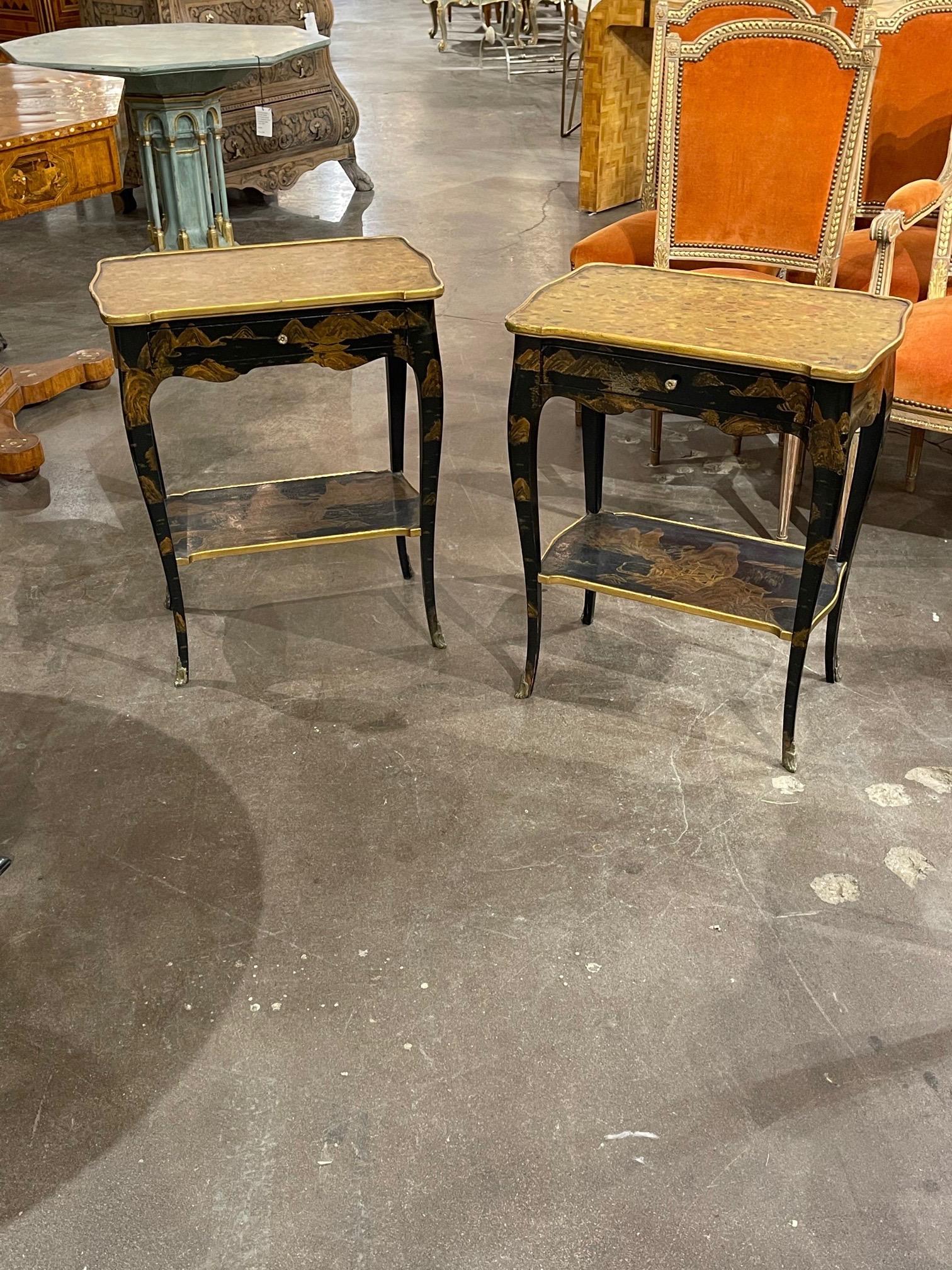 Very fine pair of 19th century French black lacquered tables with hand painted chinoiserie design. So elegant!