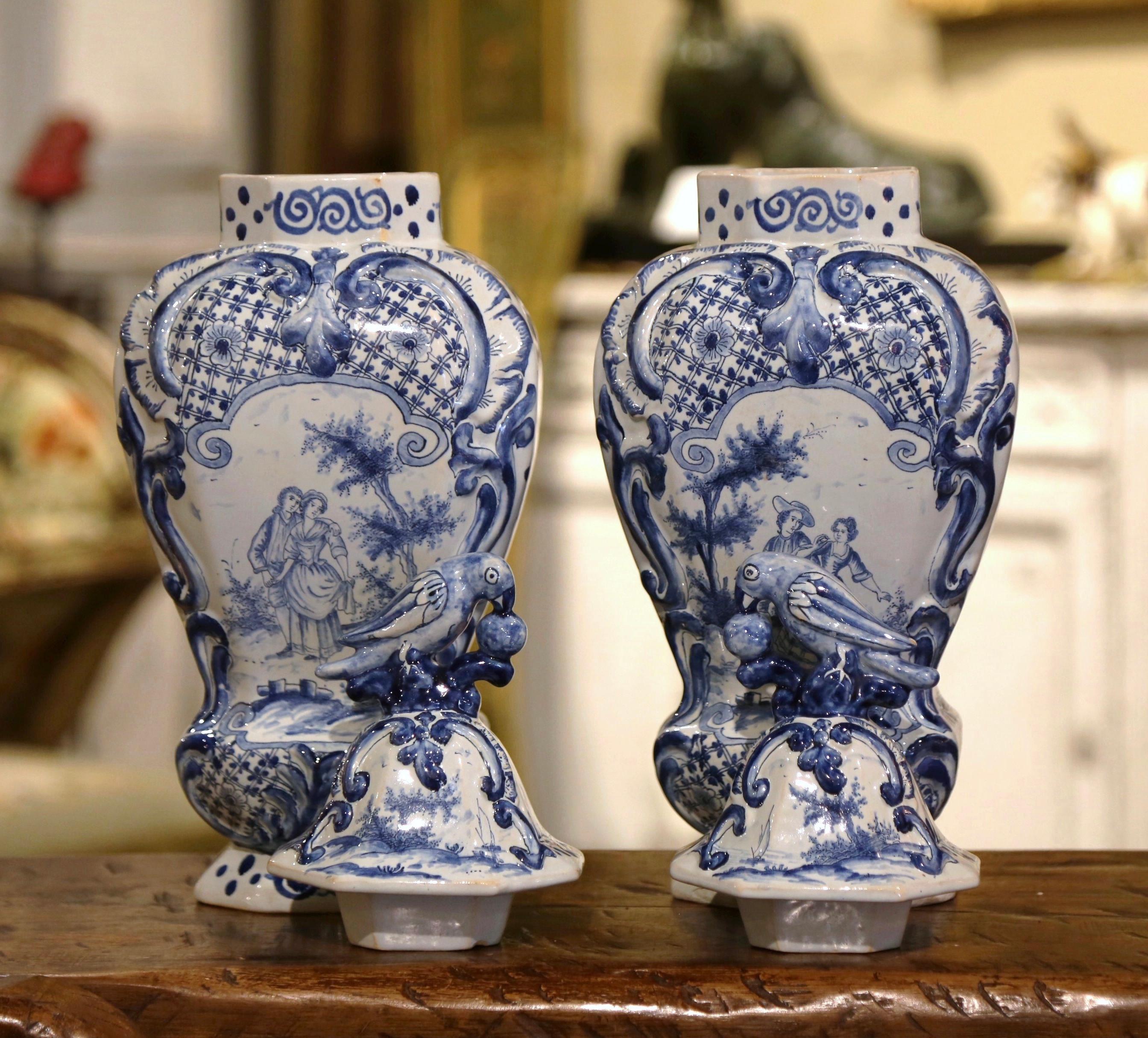 Hand-Crafted Pair of 19th Century French Blue and White Faience Delft Vases with Parrot Lids