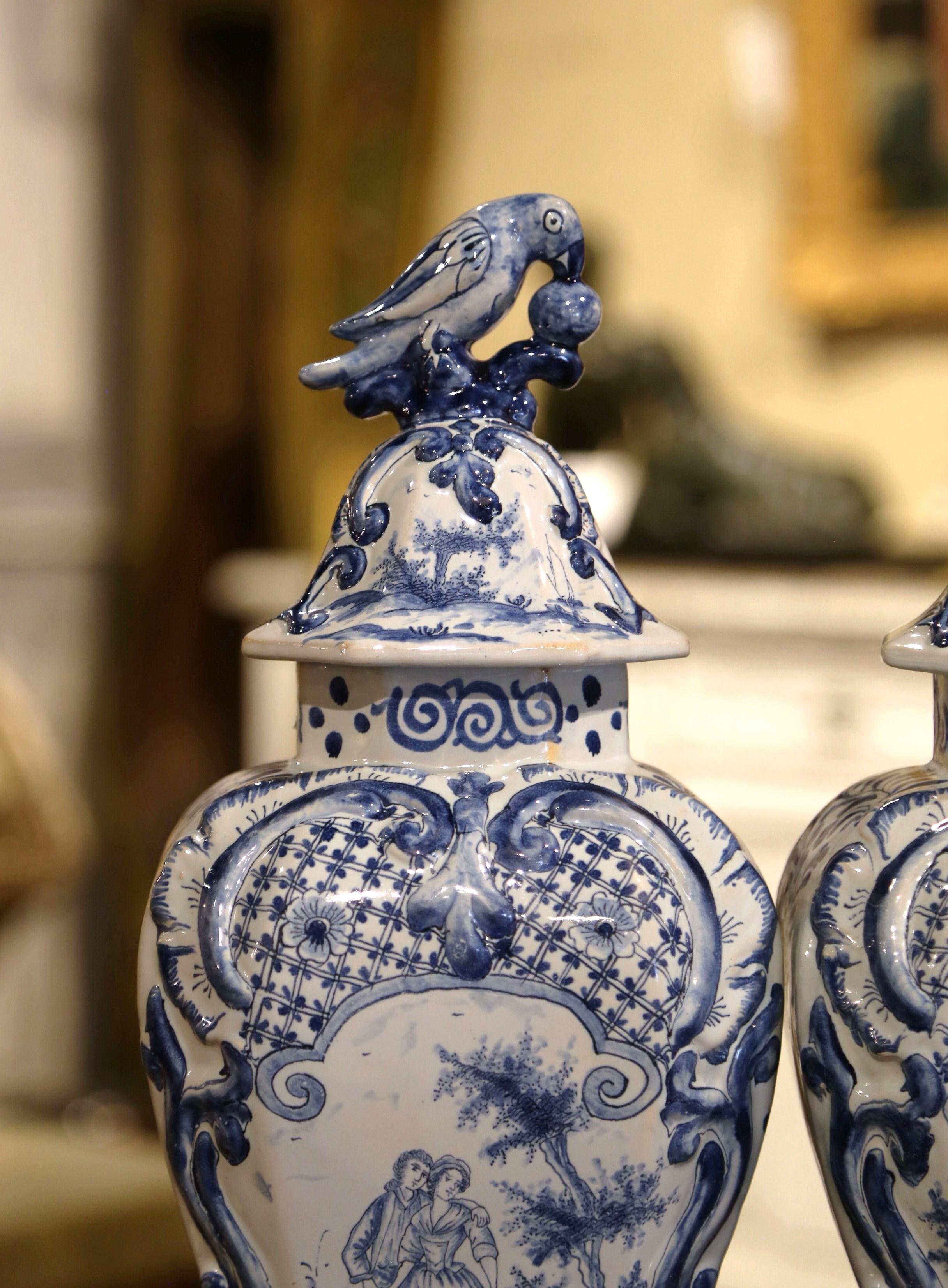 Pair of 19th Century French Blue and White Faience Delft Vases with Parrot Lids 1