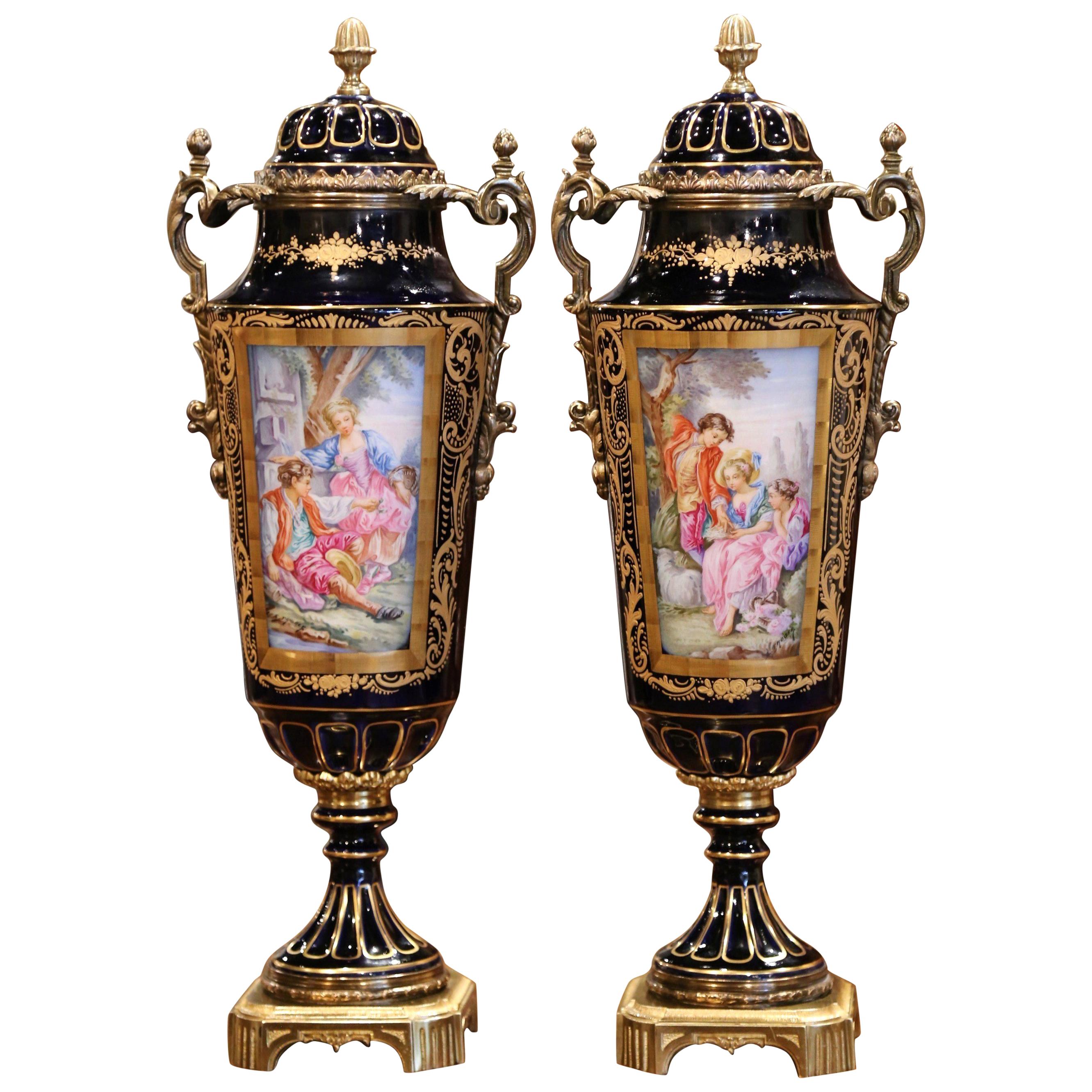 Pair of 19th Century French Blue Royal Porcelain and Bronze Sevres Urns