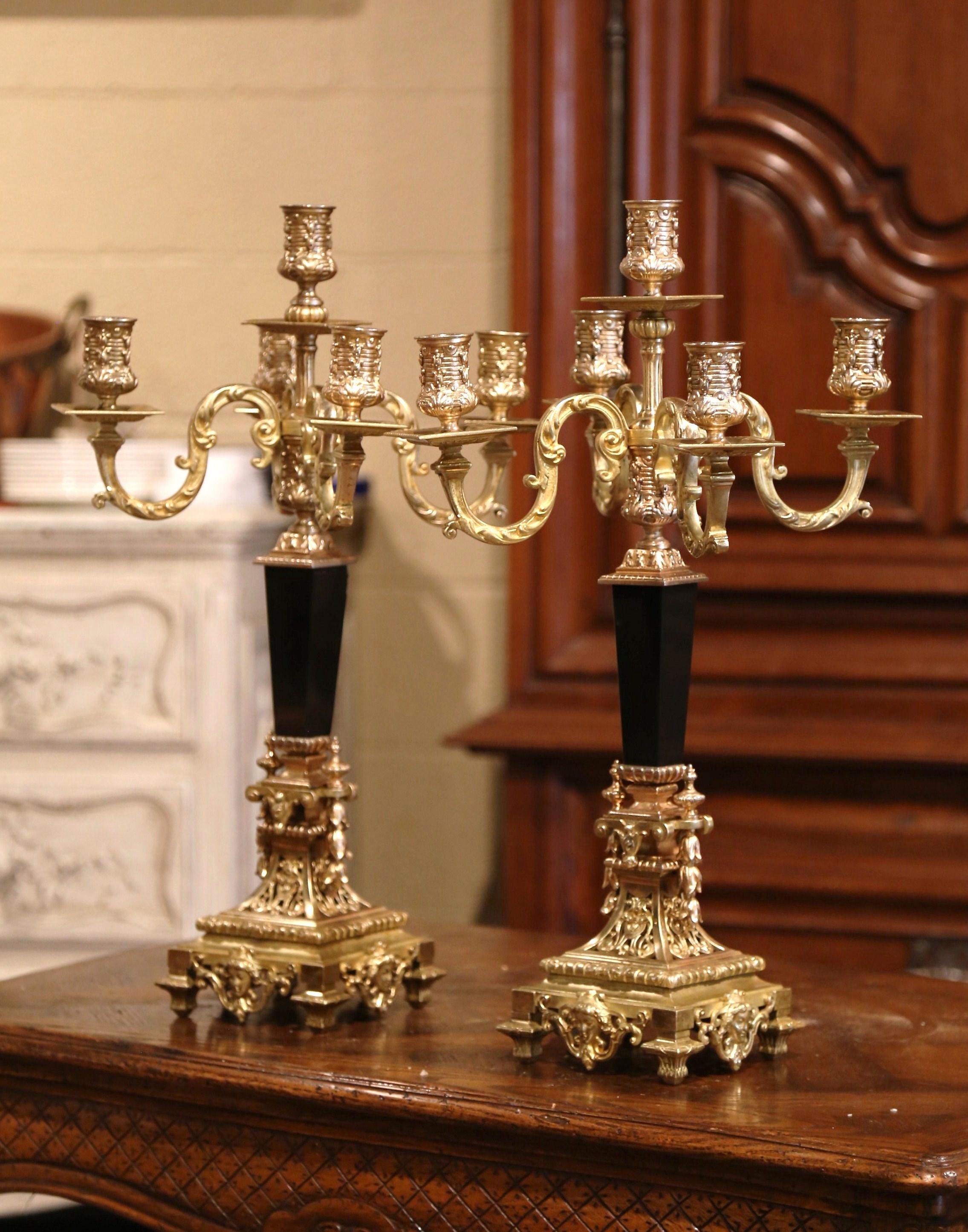 Decorate a mantel or a dining room table with this elegant pair of antique candle holders; crafted in France circa 1870, each 