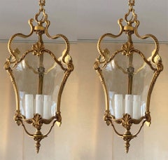 Pair of  French Art Deco Arched Crystal Gilt Bronze Three-Light Lanterns