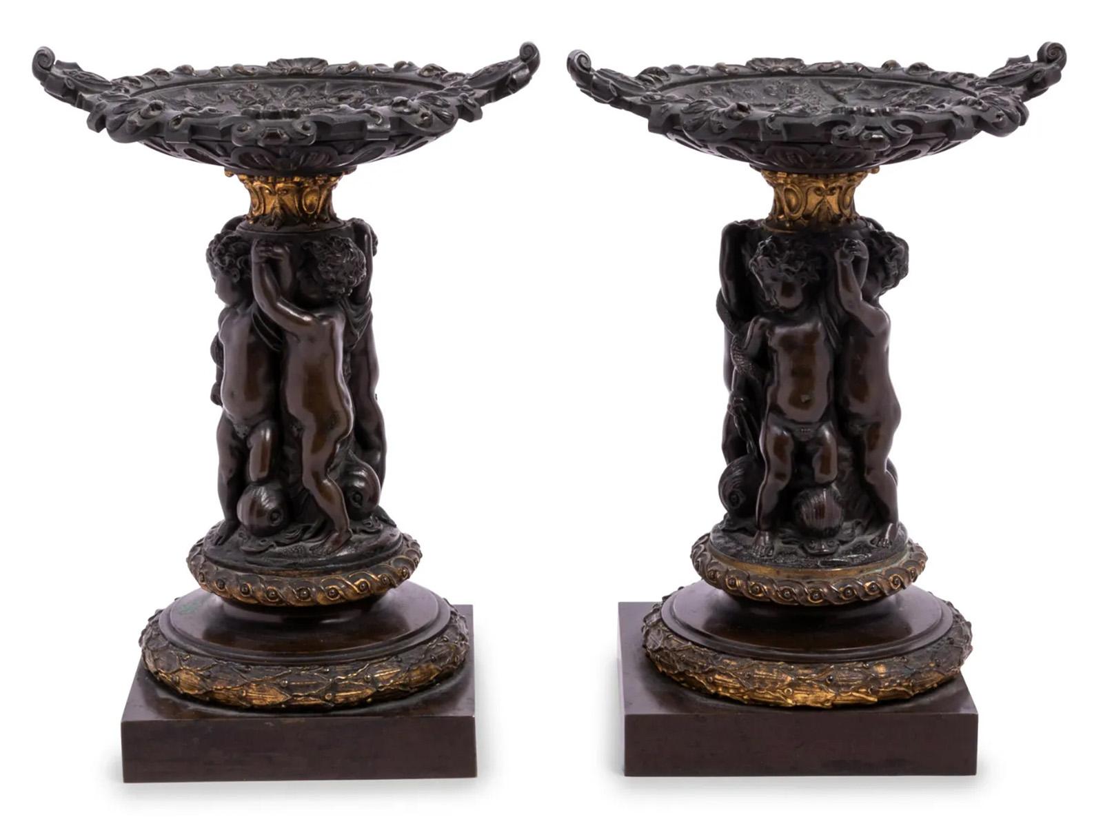 A late 19th century pair of French bronze figural tazza. 

Dimensions: 12.5