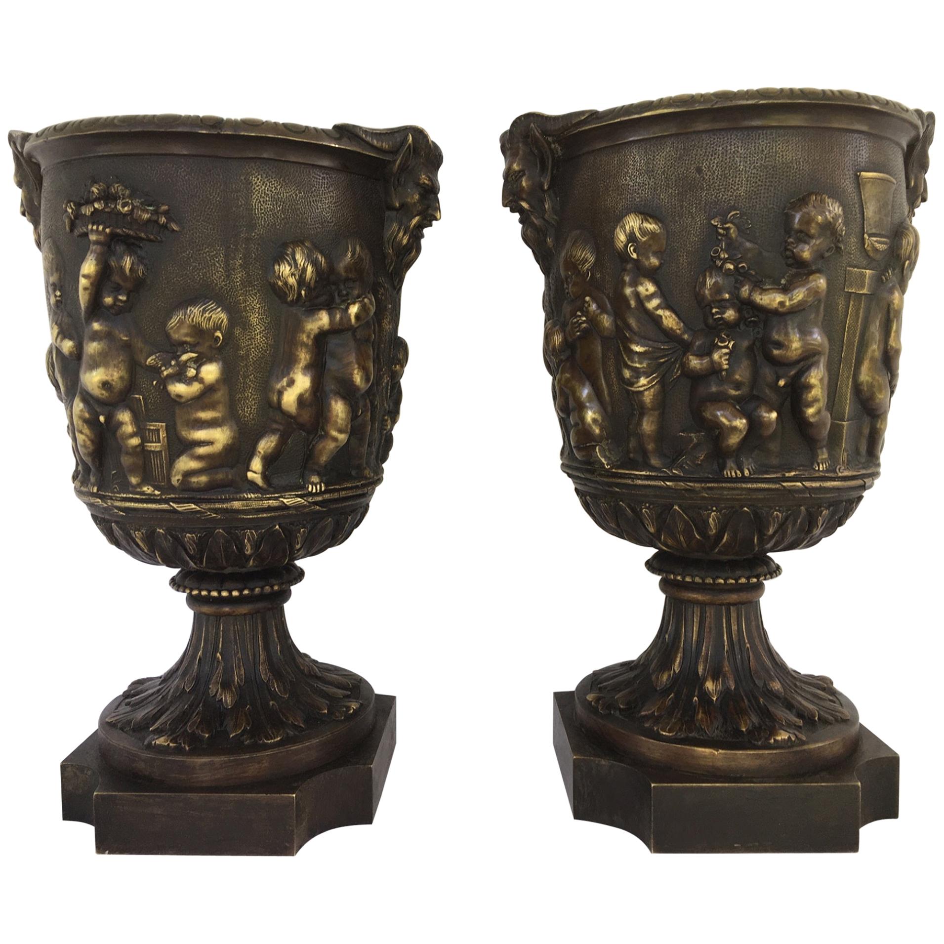 Pair of 19th Century French Bronze Urns after Clodion