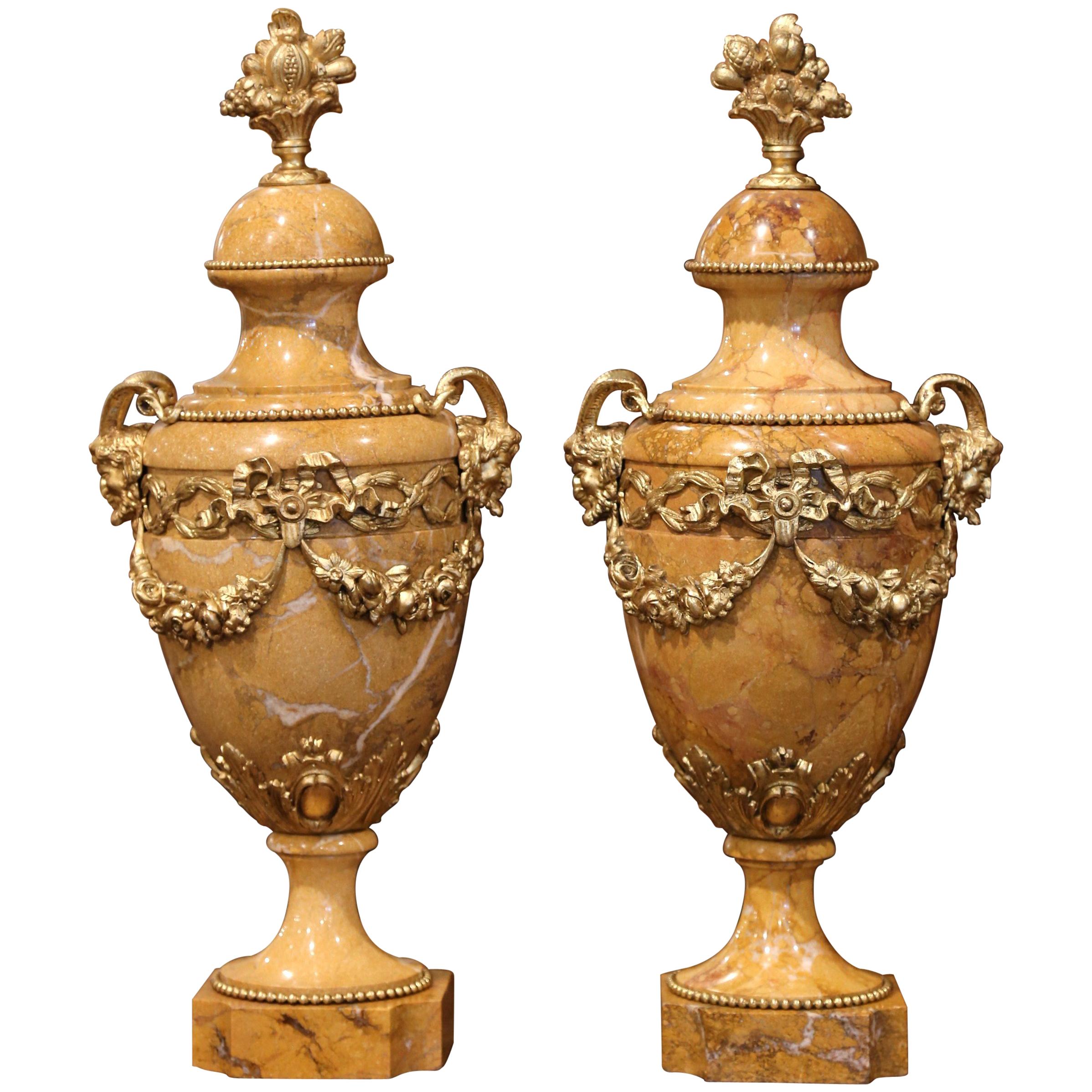 Pair of 19th Century French Carved Beige Marble and Bronze Cassolettes