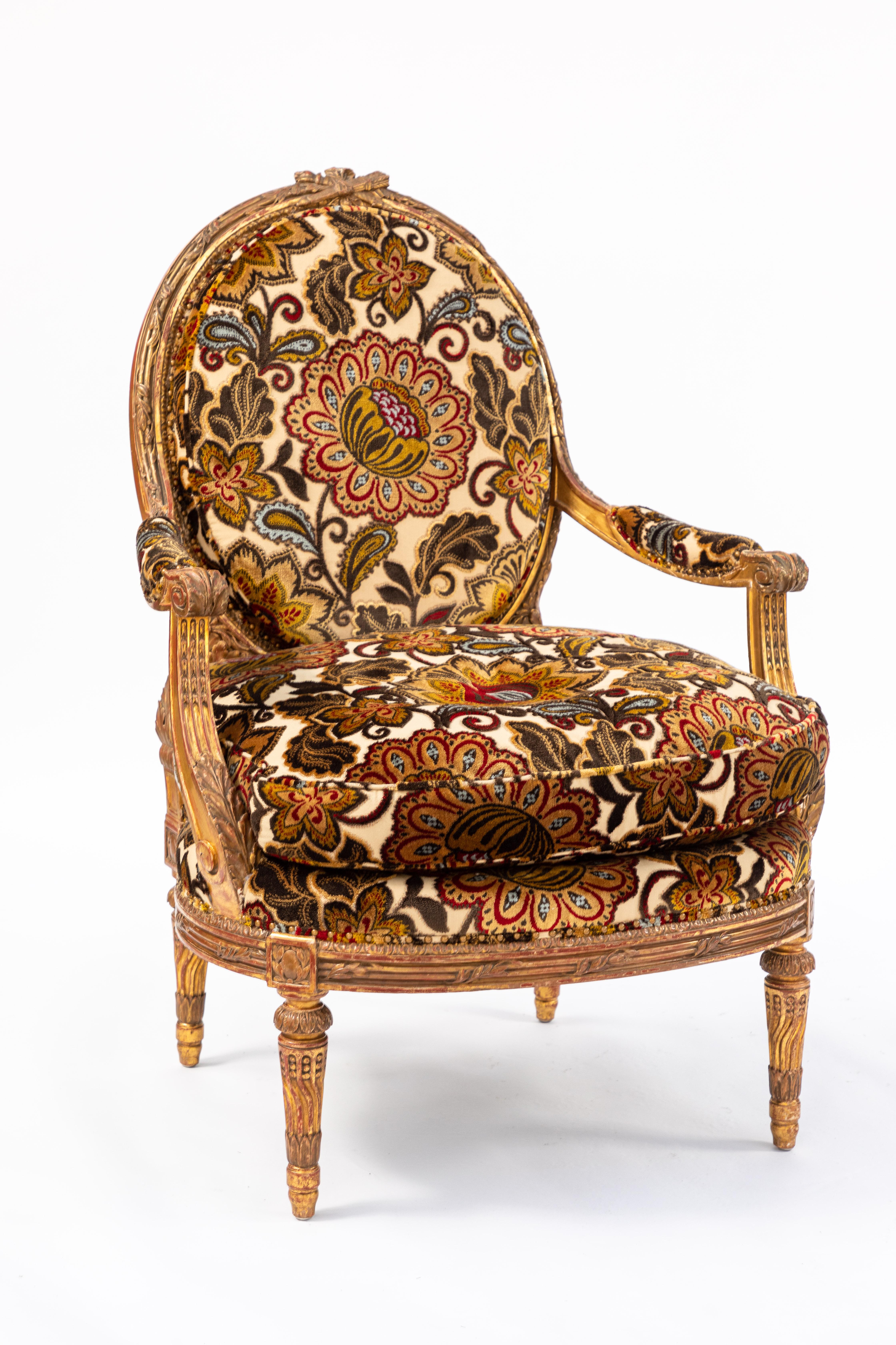 Pair of fine 19th century French carved giltwood armchairs with newly upholstered cut velvet floral fabric.