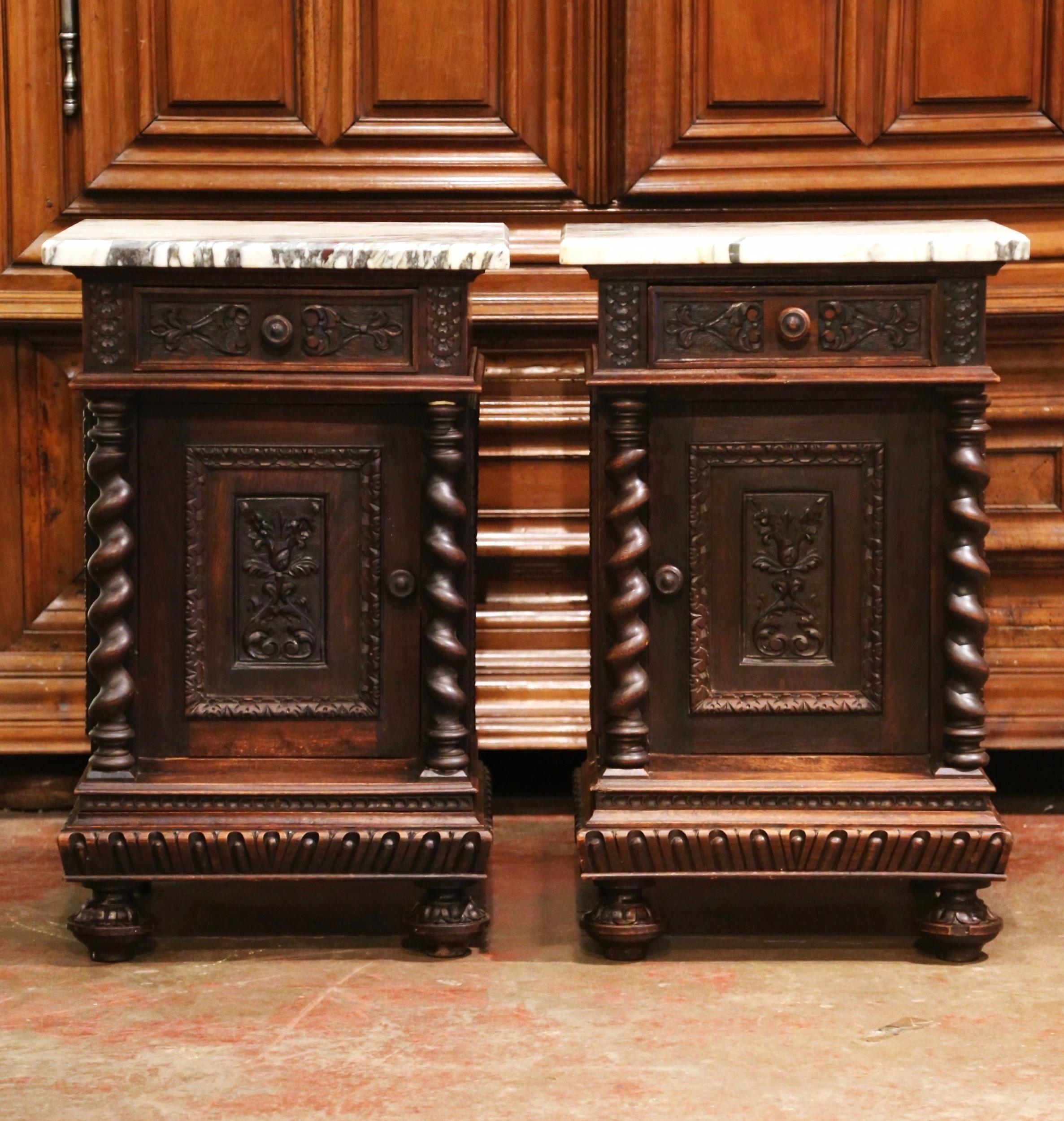 Complete a bedroom with this elegant pair of antique bedside tables. Crafted in France circa 1880 and almost square in shape, each Louis XIII style bedside tables stands on front bun feet over a decorative bottom plinth. Each cabinet features a top