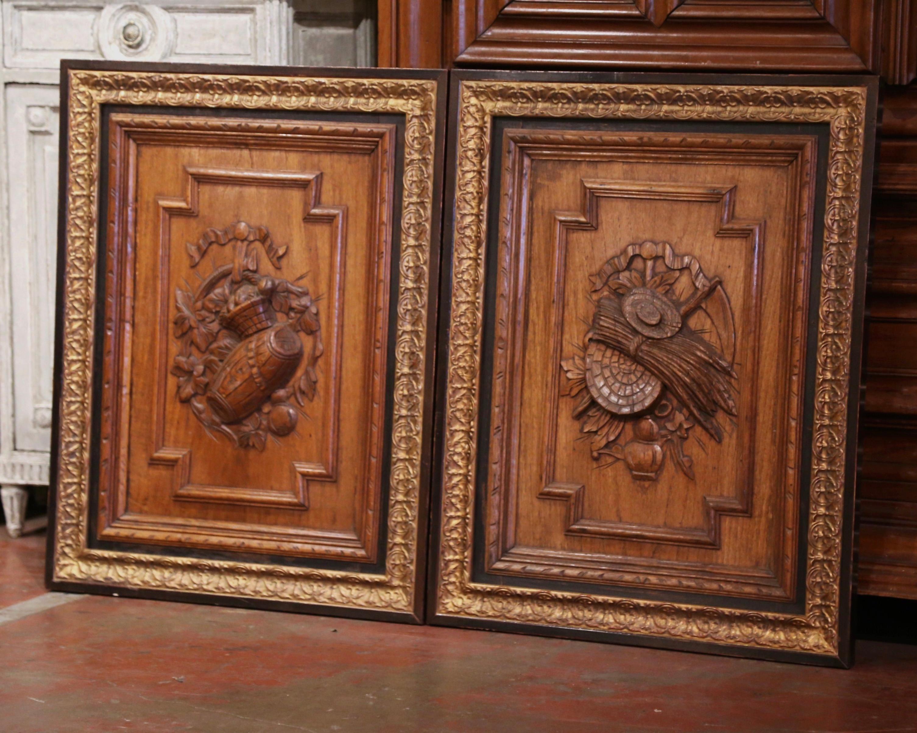 Decorate a man's office with this pair of elegant antique panels. Crafted in France, circa 1870, and made of oak, the sculpted elements are decorated with exquisite carvings in high relief; one-door features a central medallion with a basket of