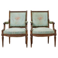Pair of 19th century French carved walnut armchairs