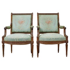 Pair of 19th century French carved walnut armchairs